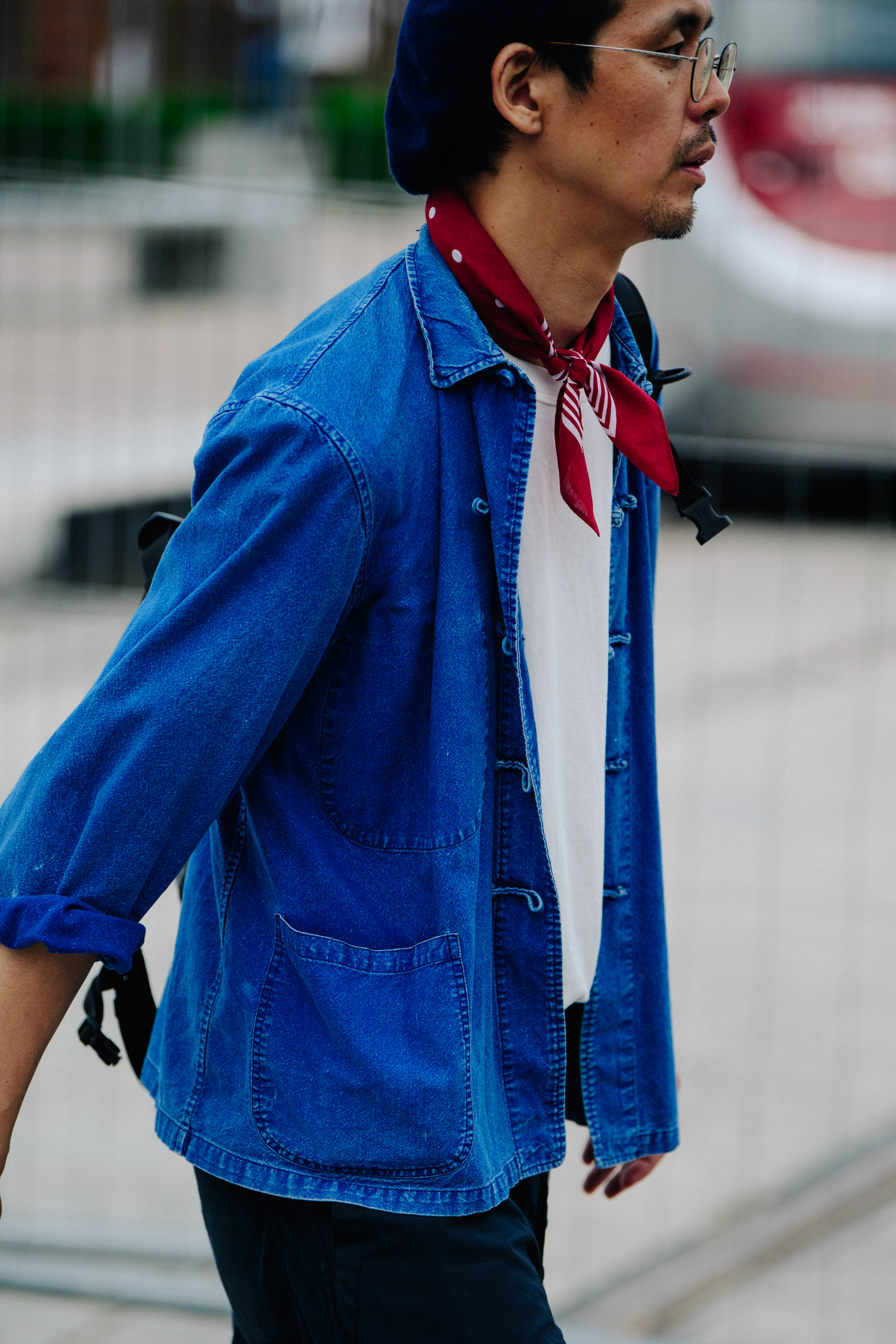 Man wearing red scarf