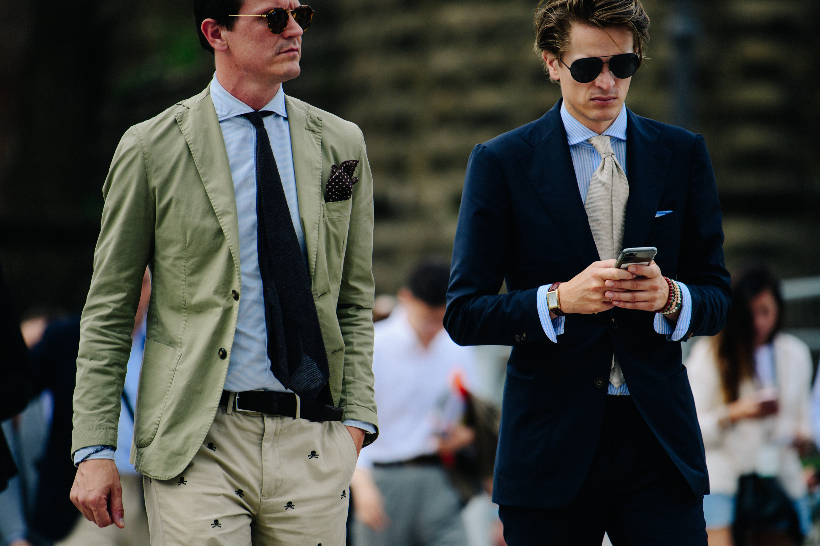 Two men wearing suits