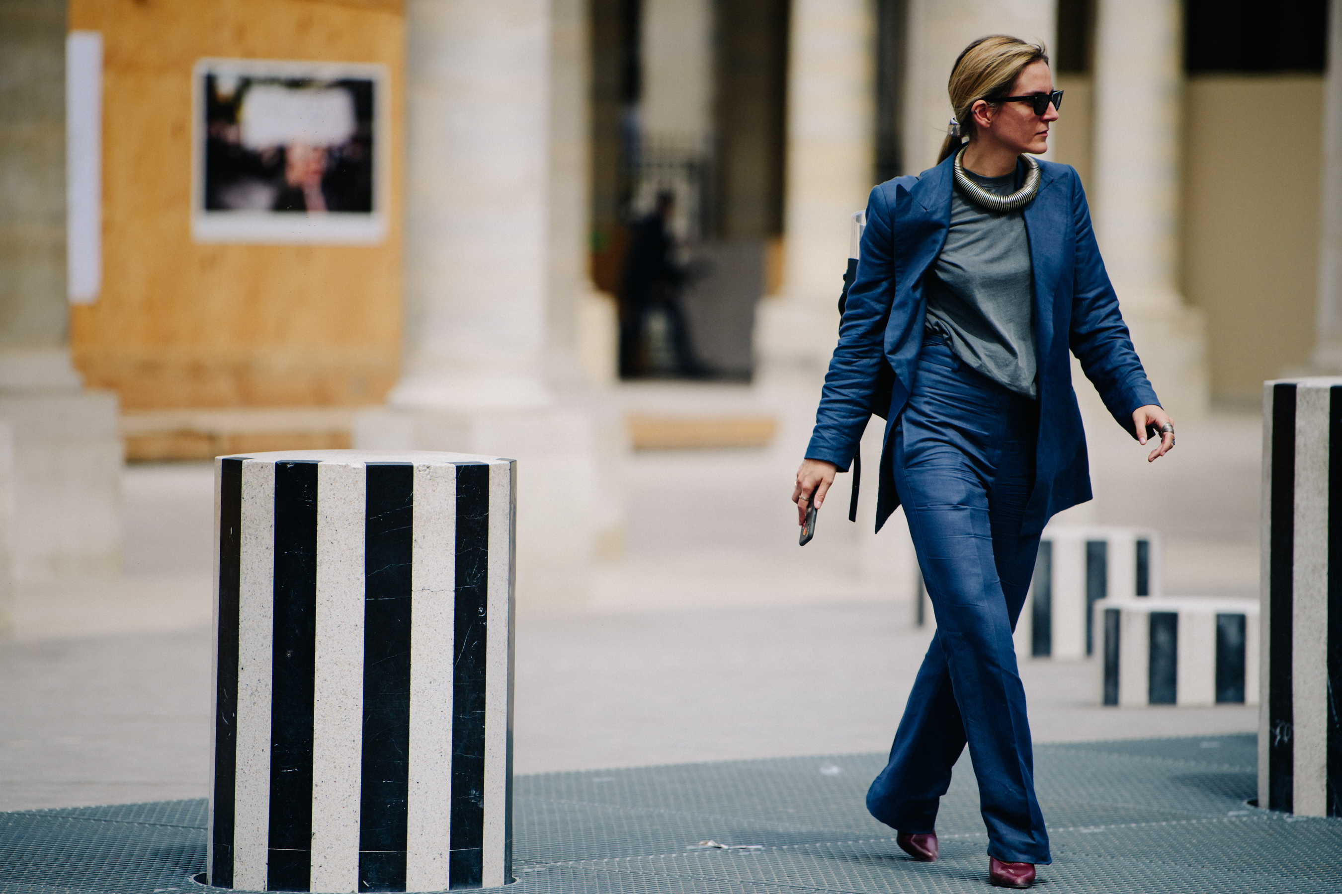 Woman wearing grey suit