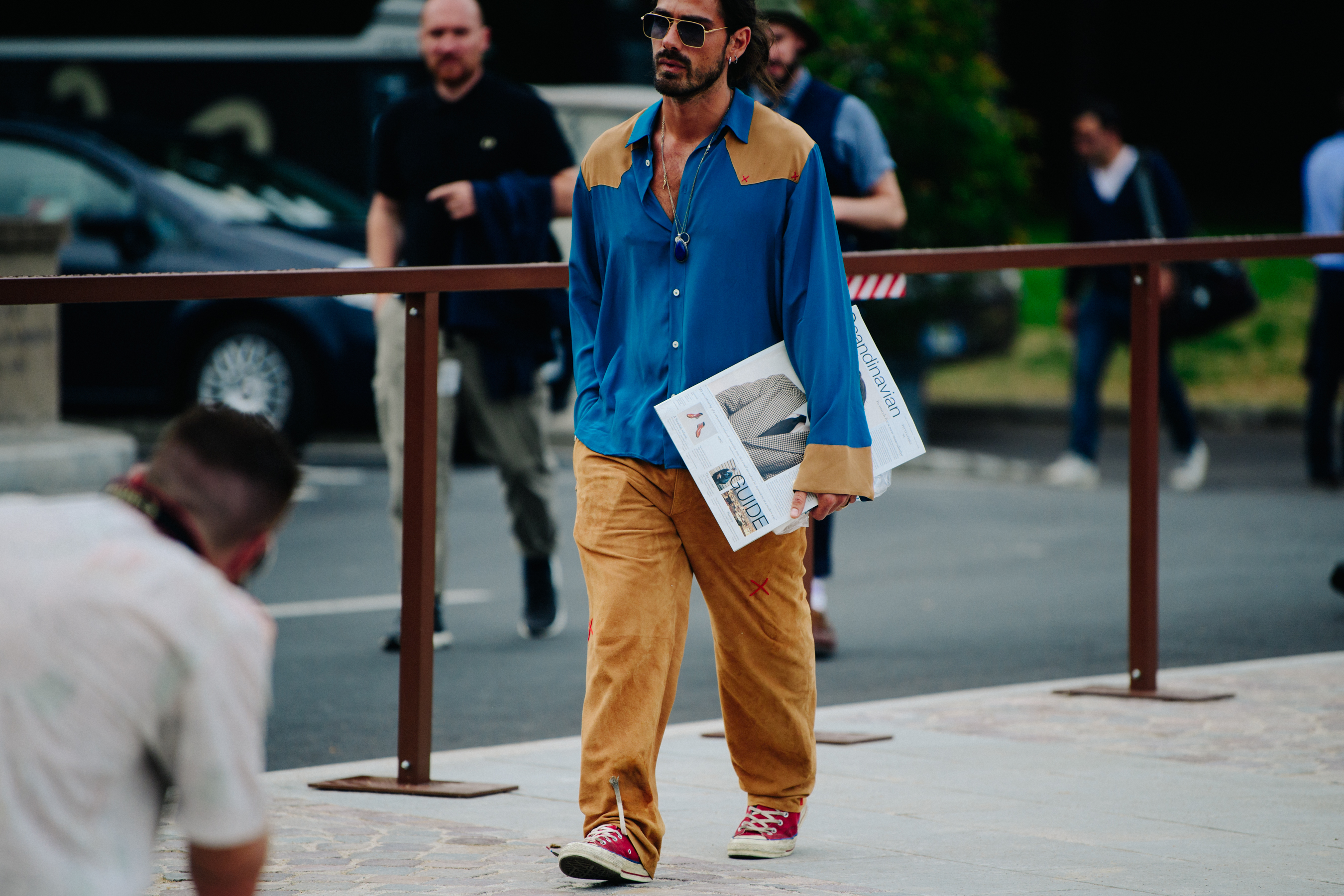Man wearing blue western shirt