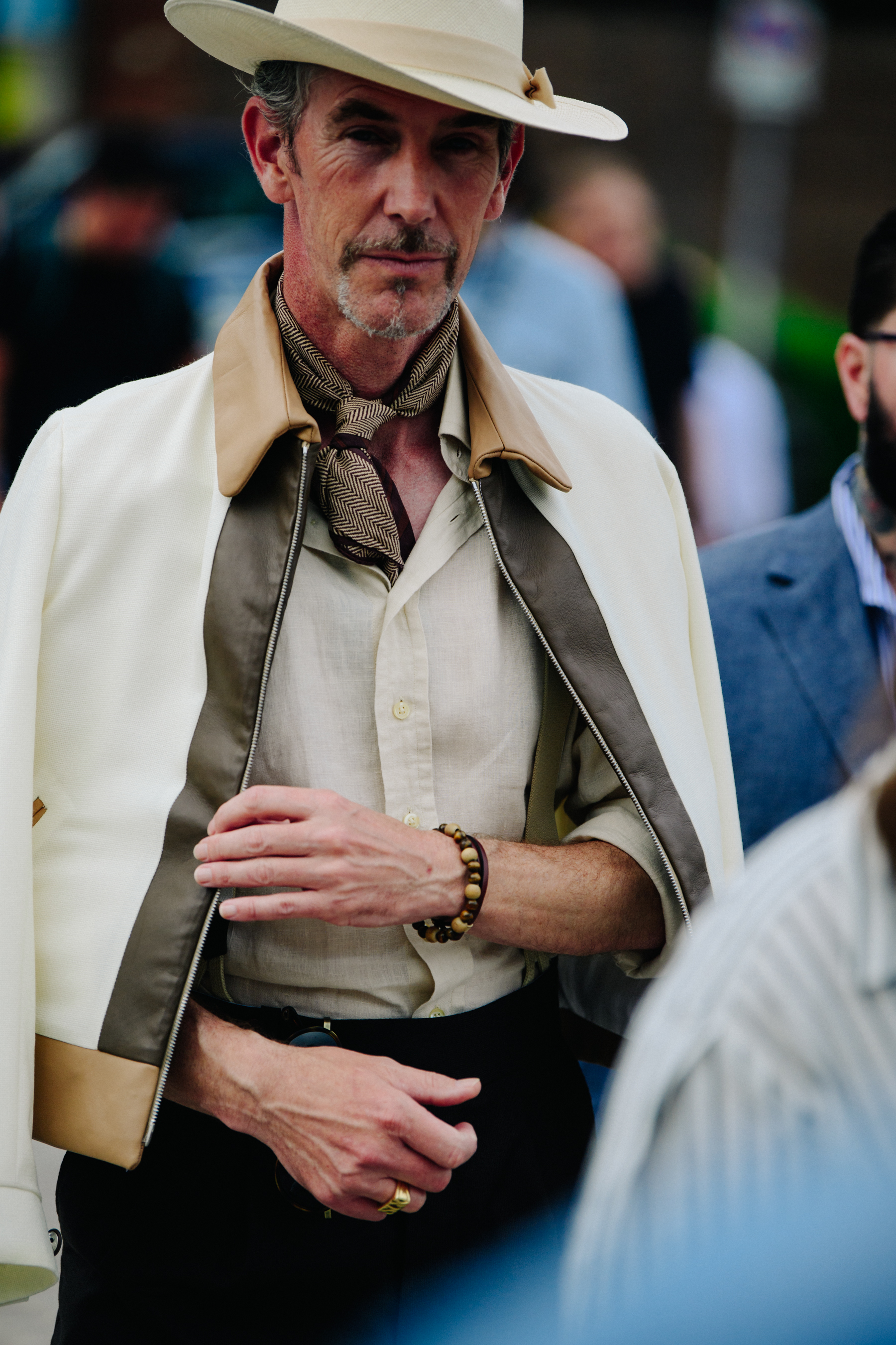 Man wearing light suit