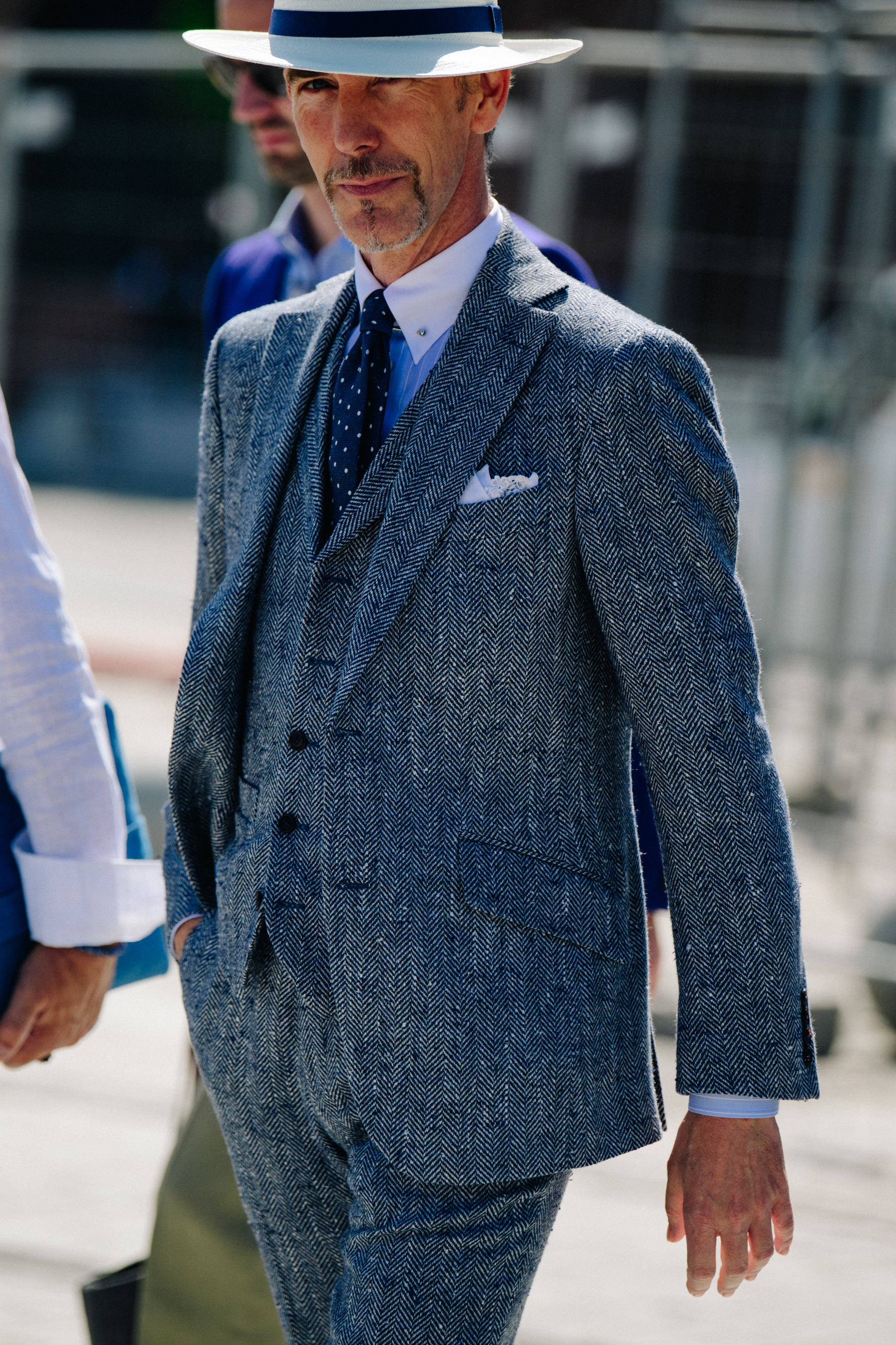 Man wearing grey suit