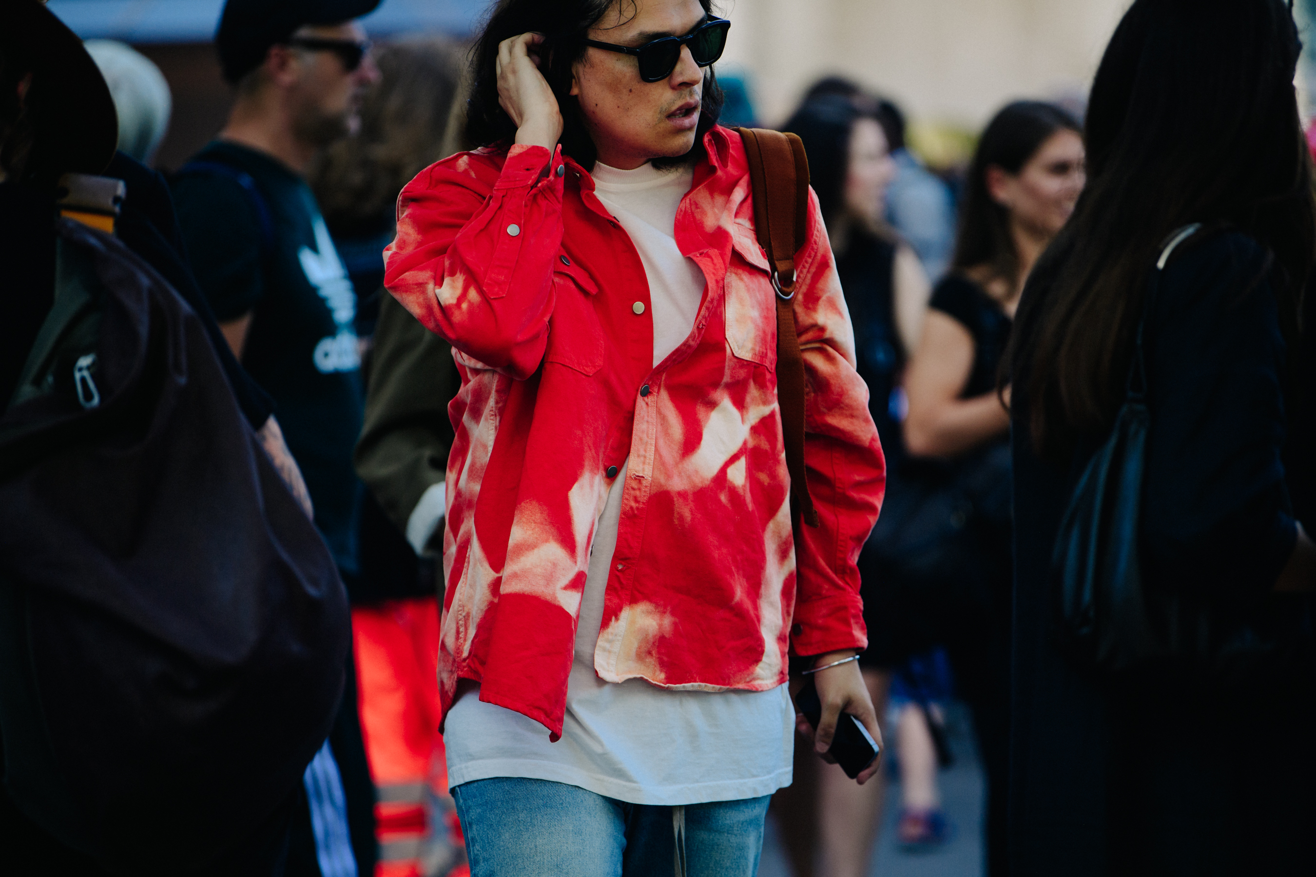 Man wearing red denim shirt