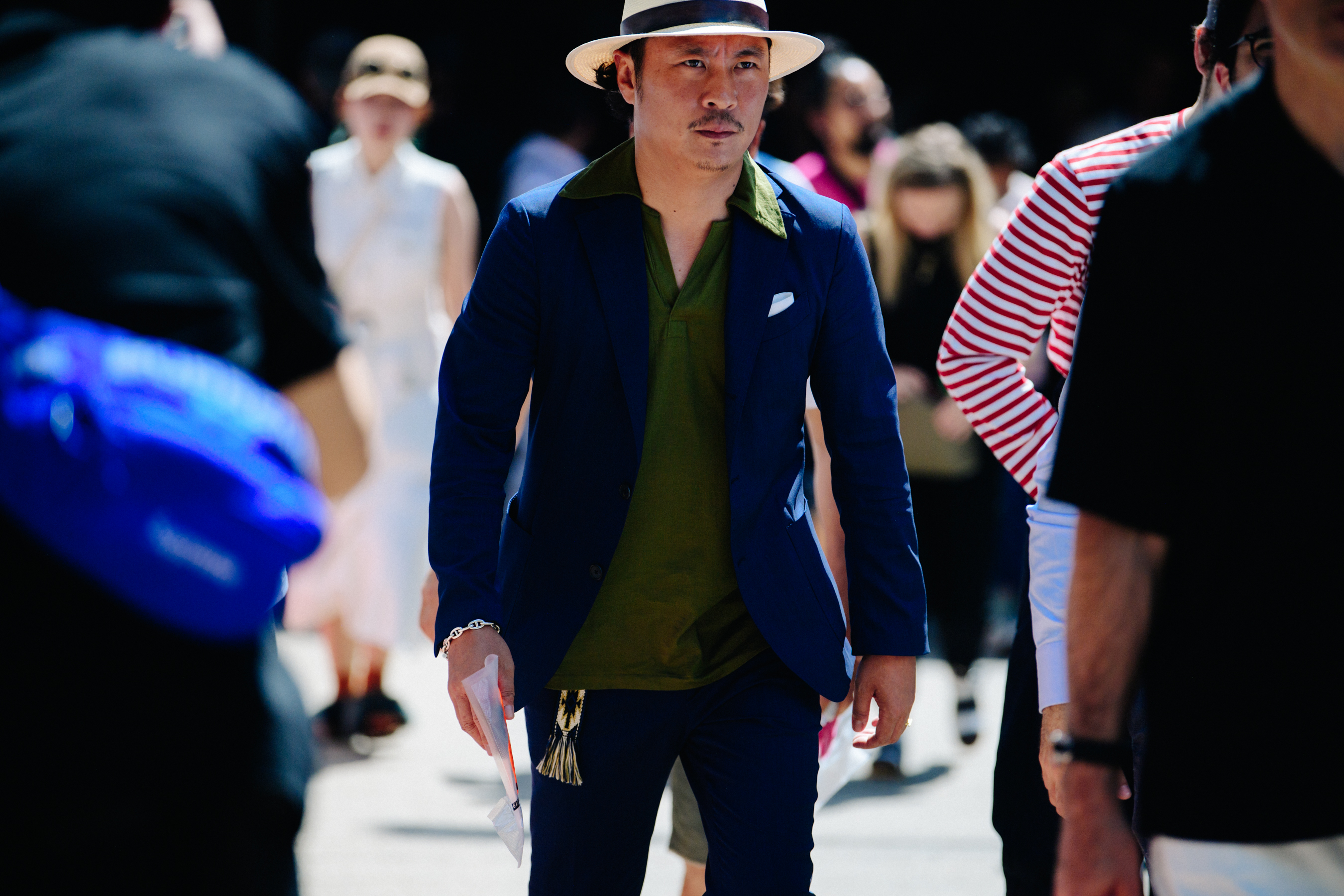 Man wearing green polo neck