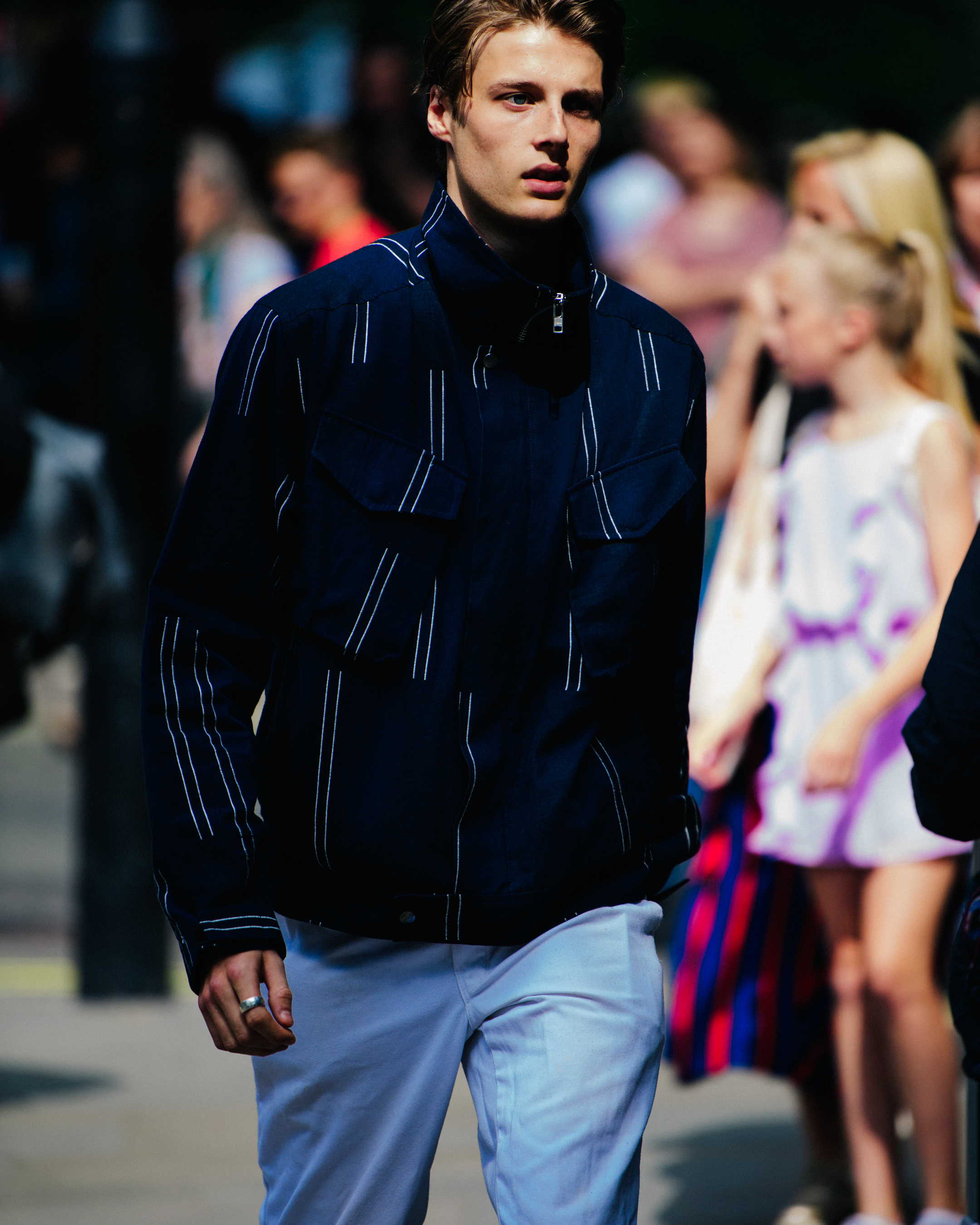Model wearing striped jacket