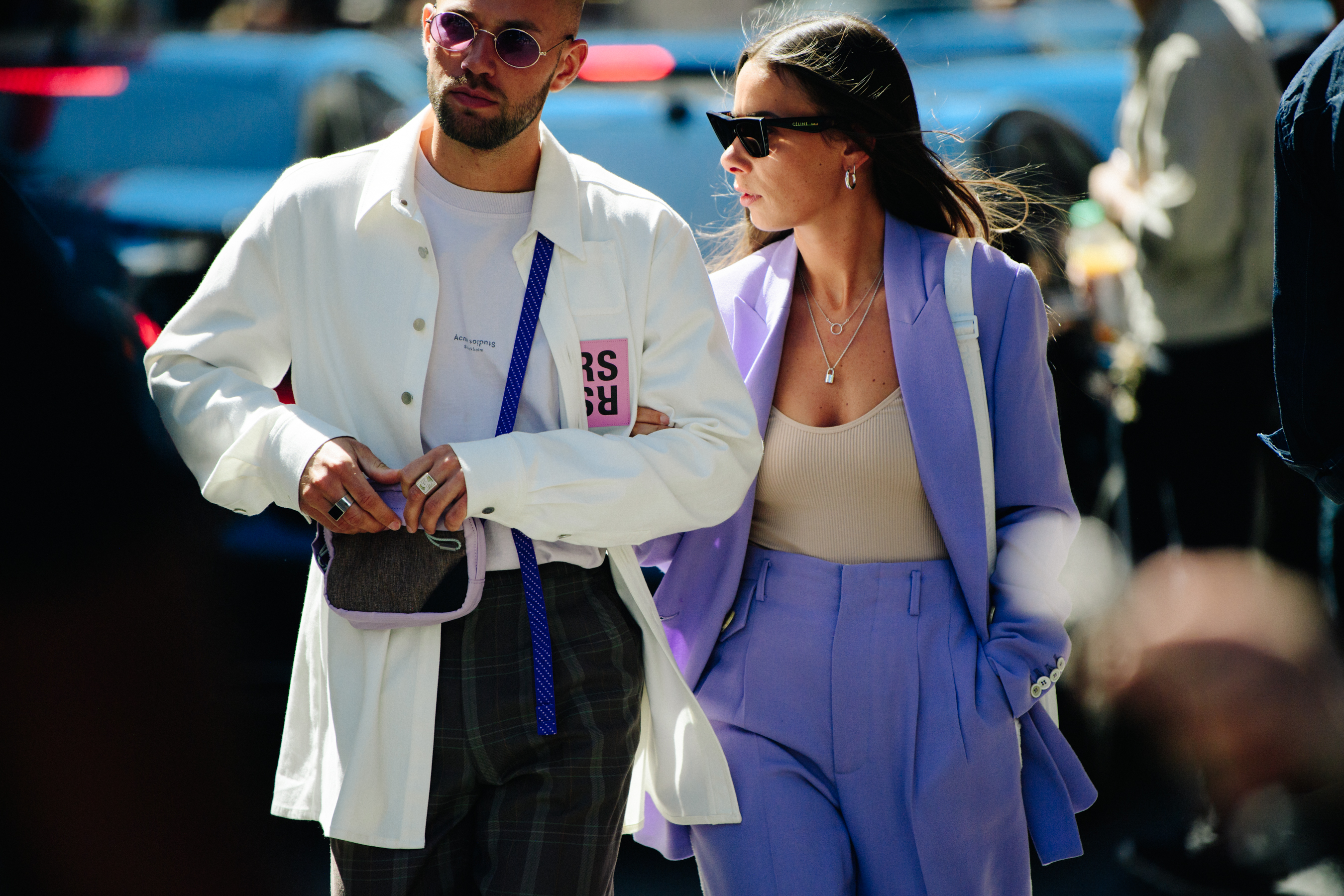 Couple wearing white and purple