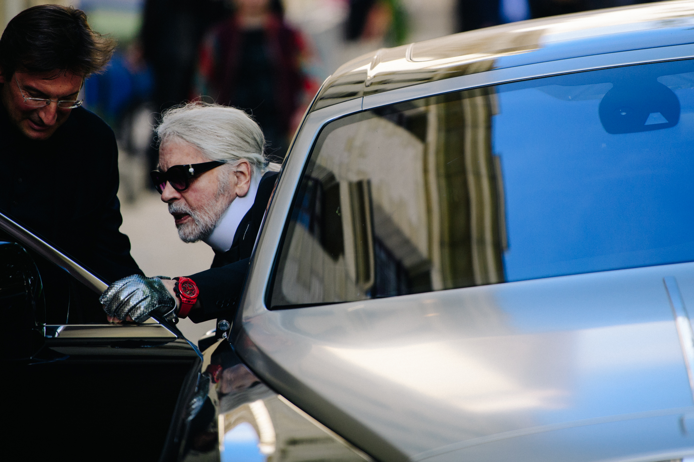 Karl Lagerfeld wearing signature suit