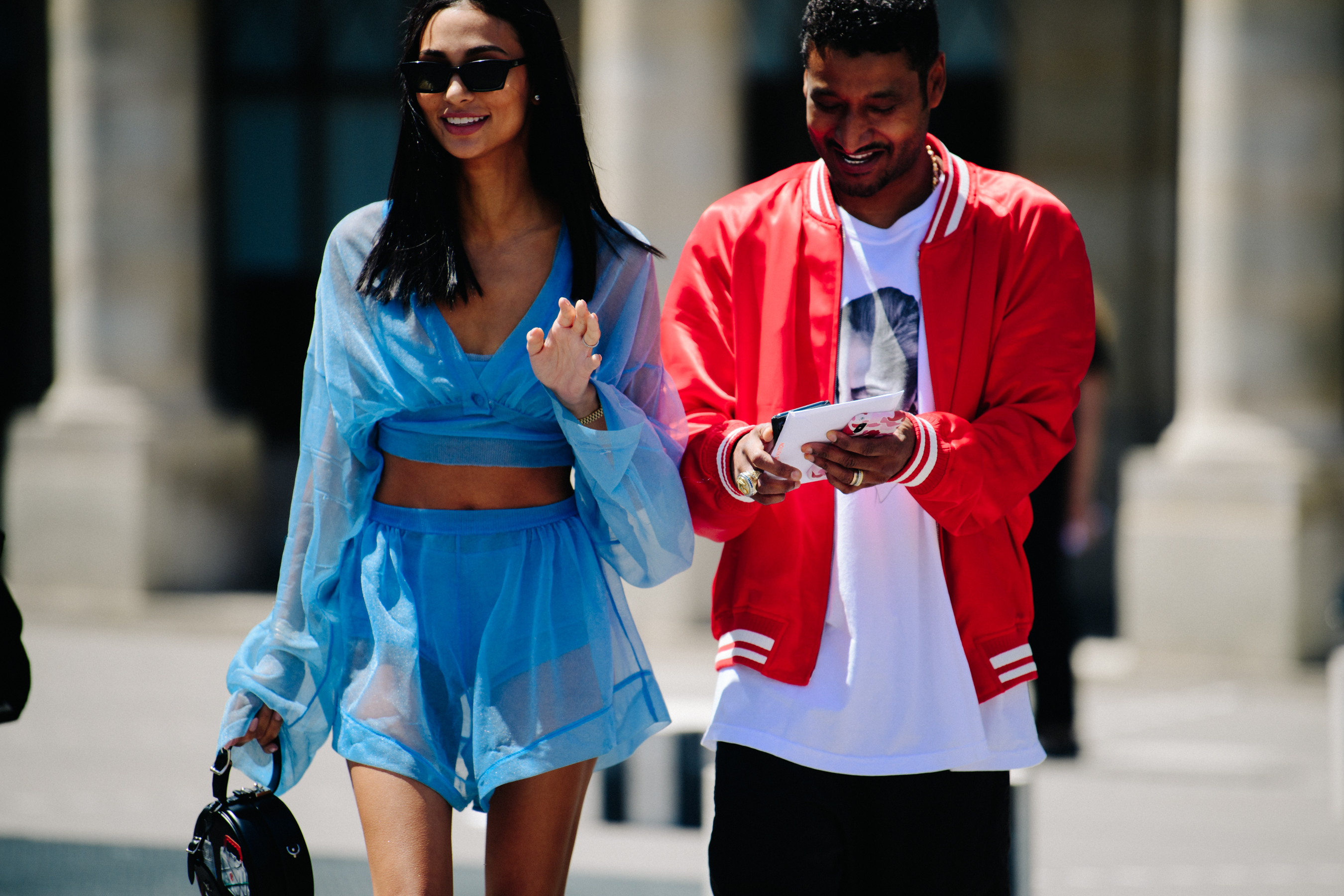 Brother and sister wearing blue and red
