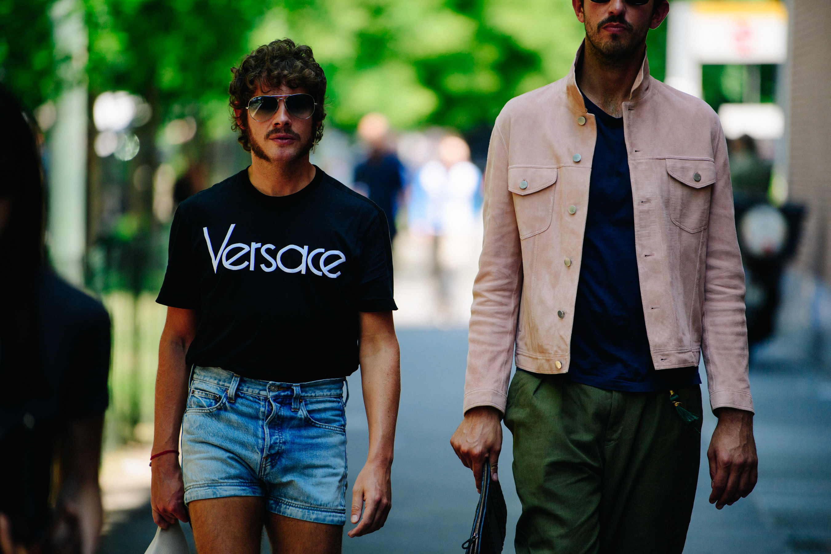 Two men wearing summer outfits