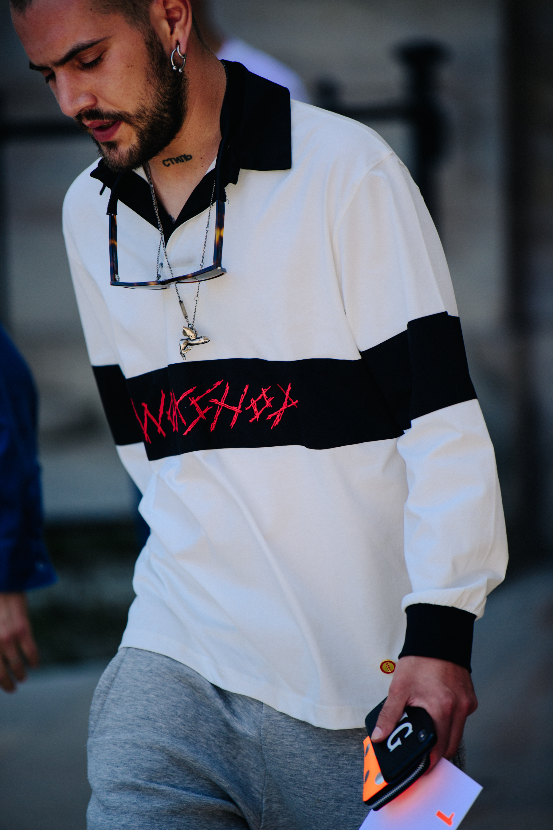 German editor wearing white jumper