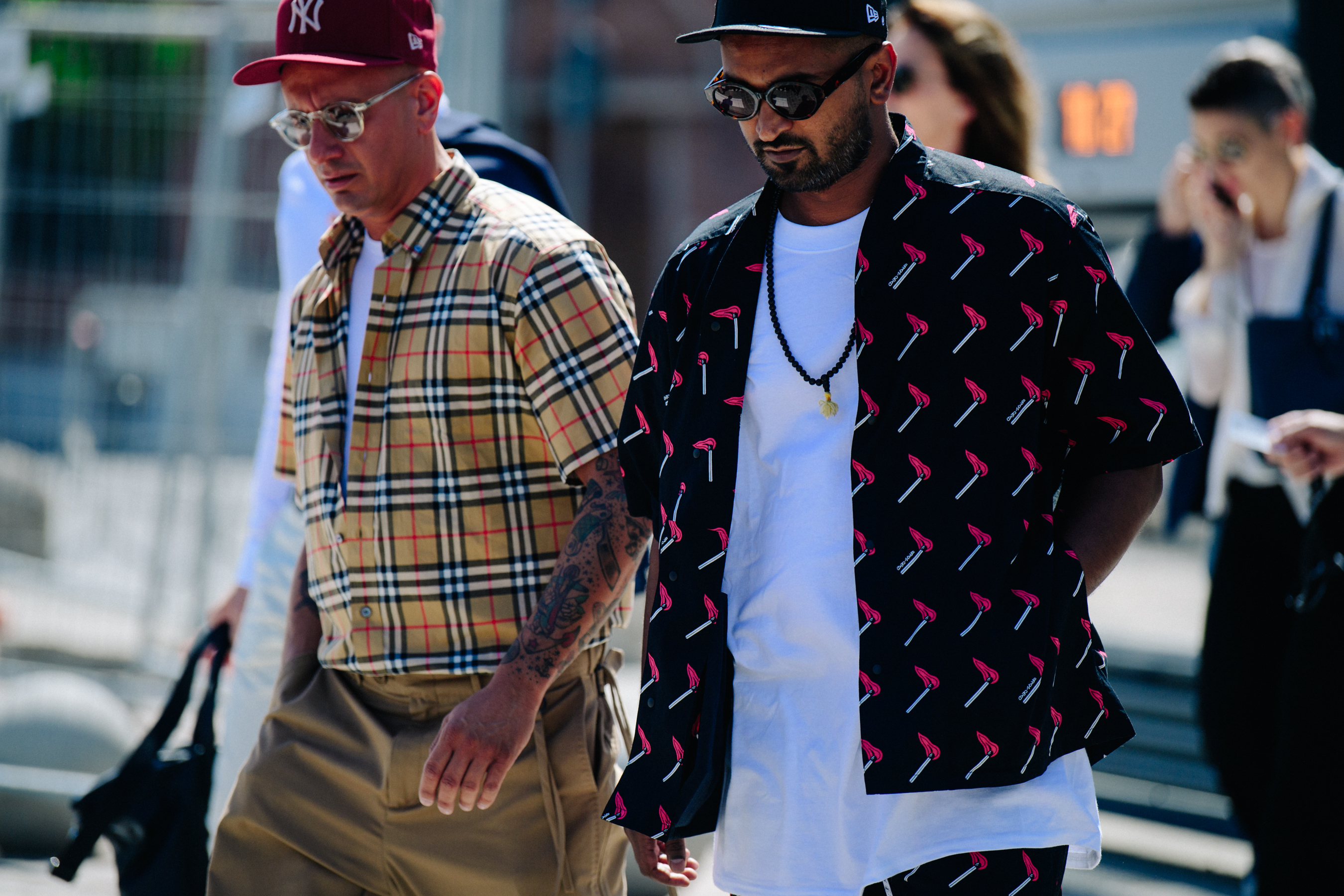 Two men wearing pattern shirts