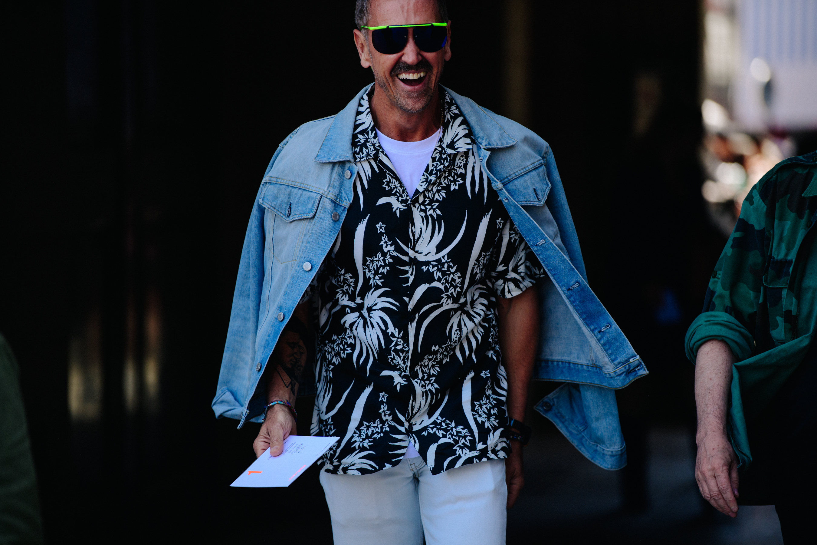 Italian stylist wearing denim jacket
