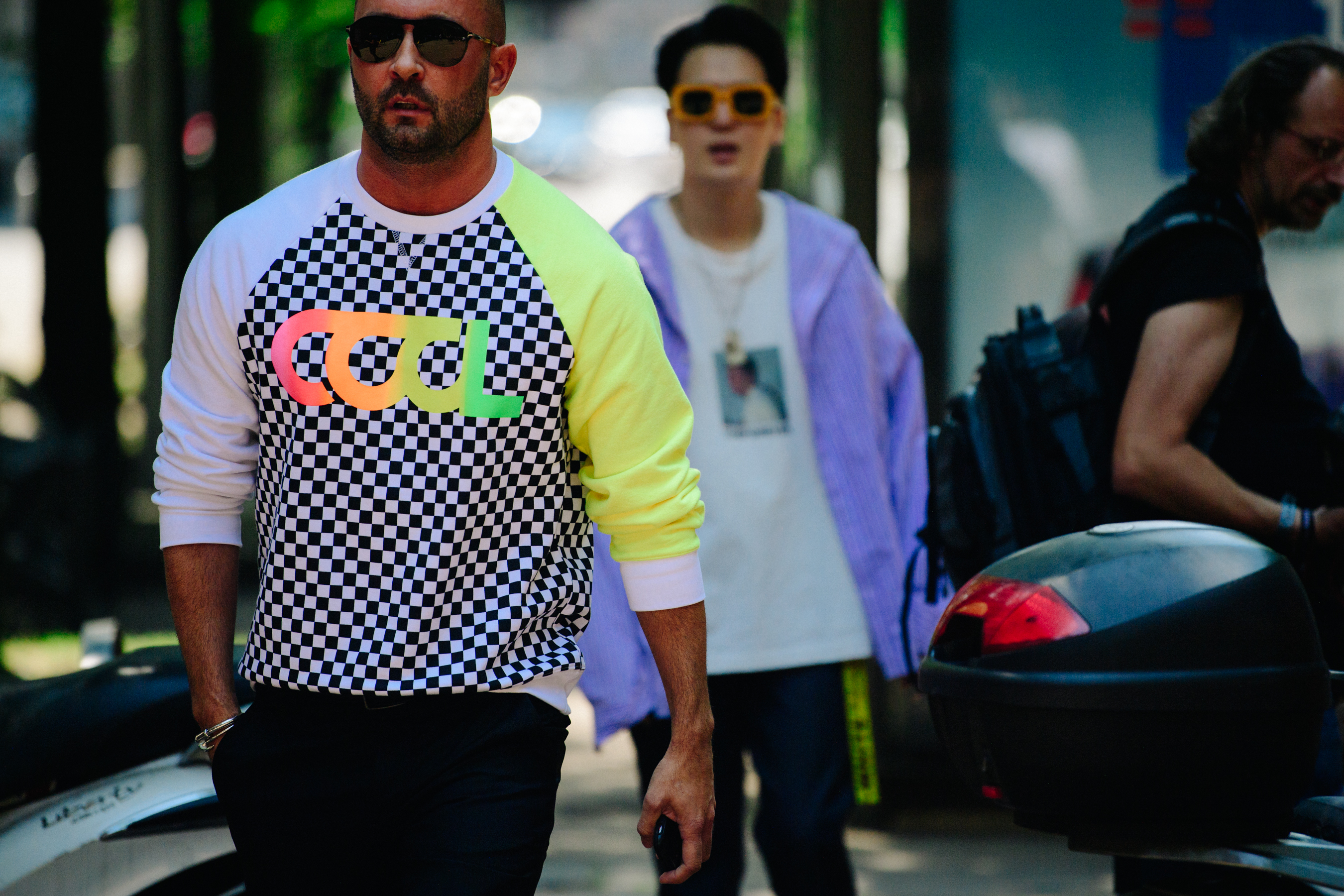 Man wearing colourful pattern jumper