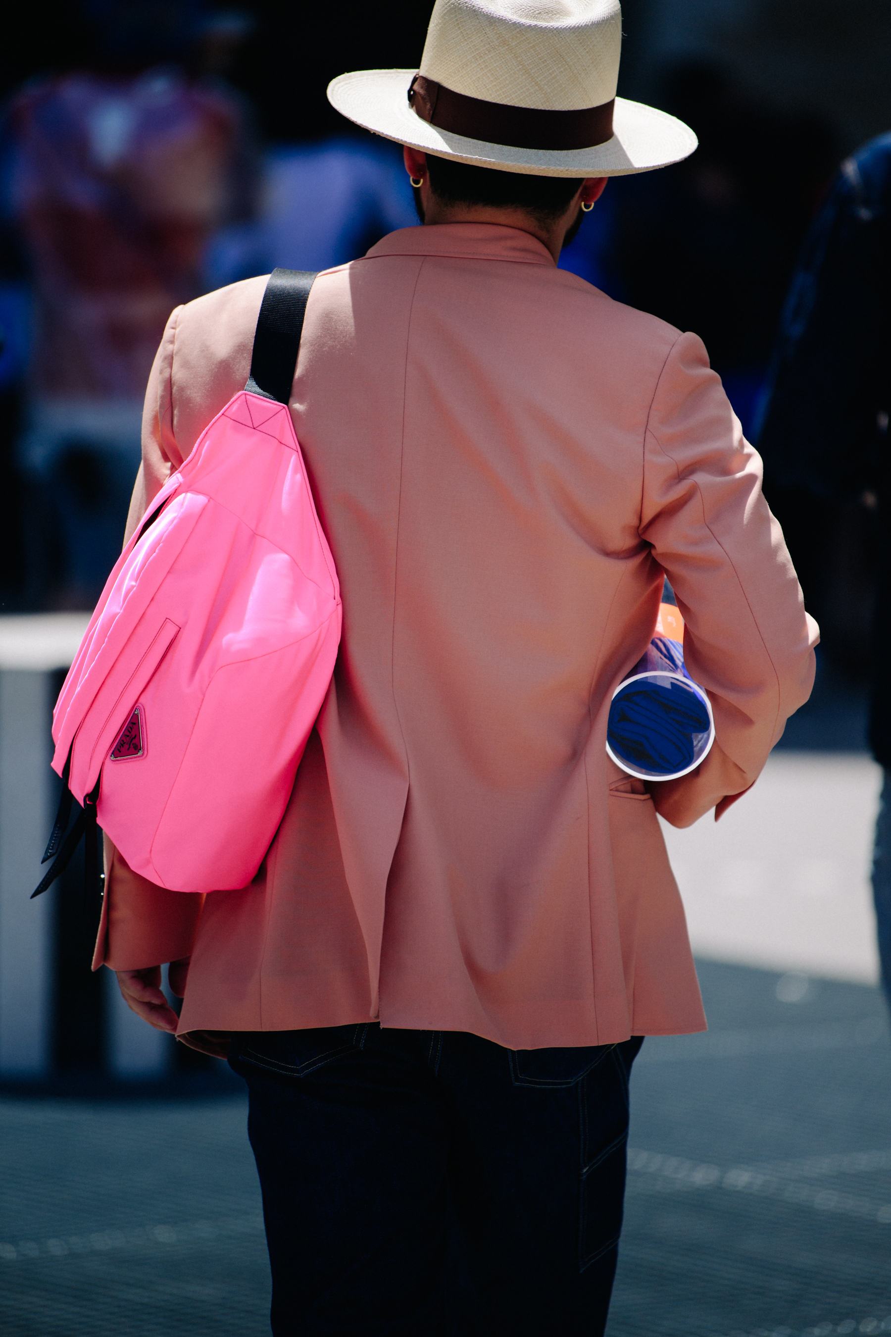 Man wearing pink blazer