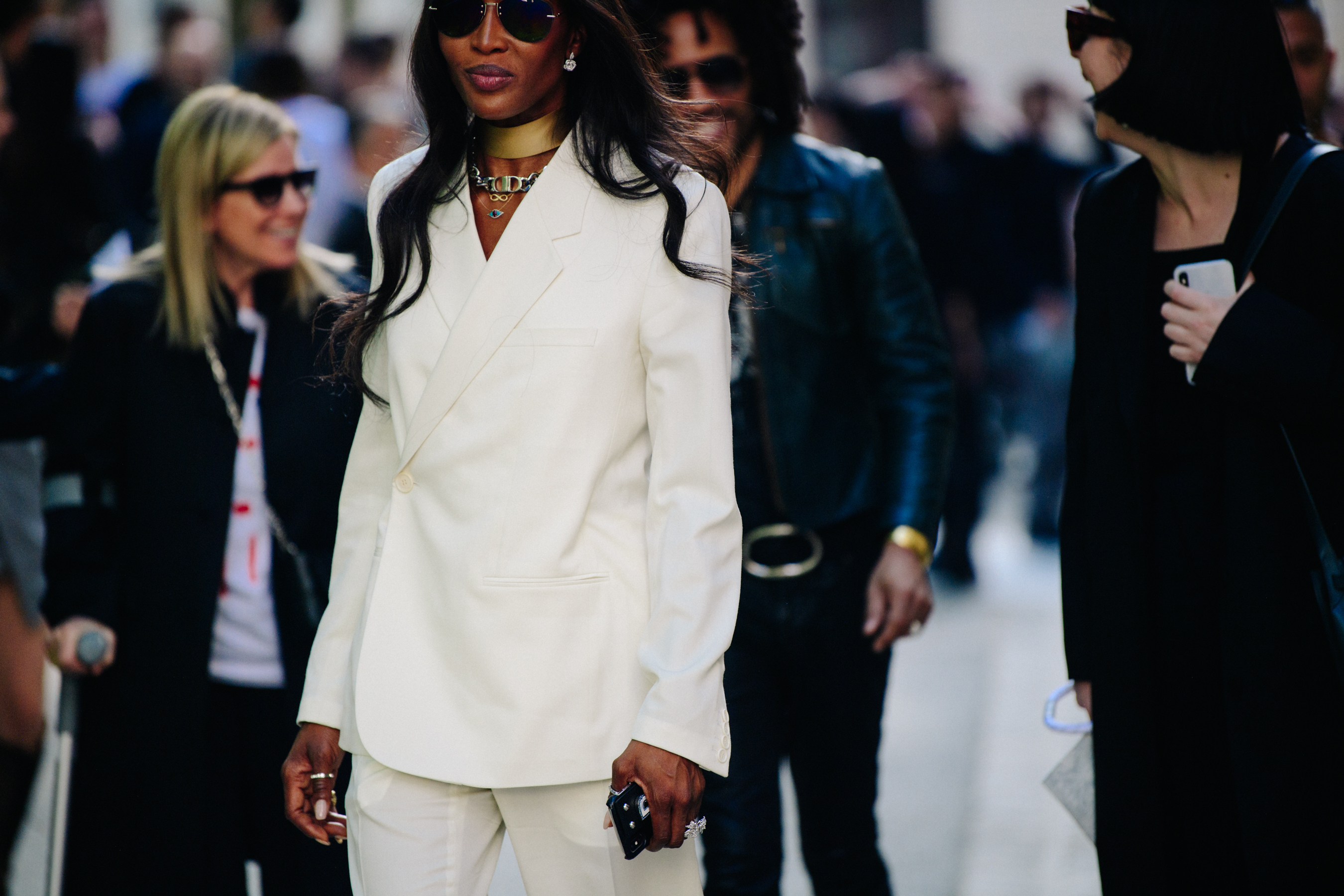Model wearing white Christian Dior suit