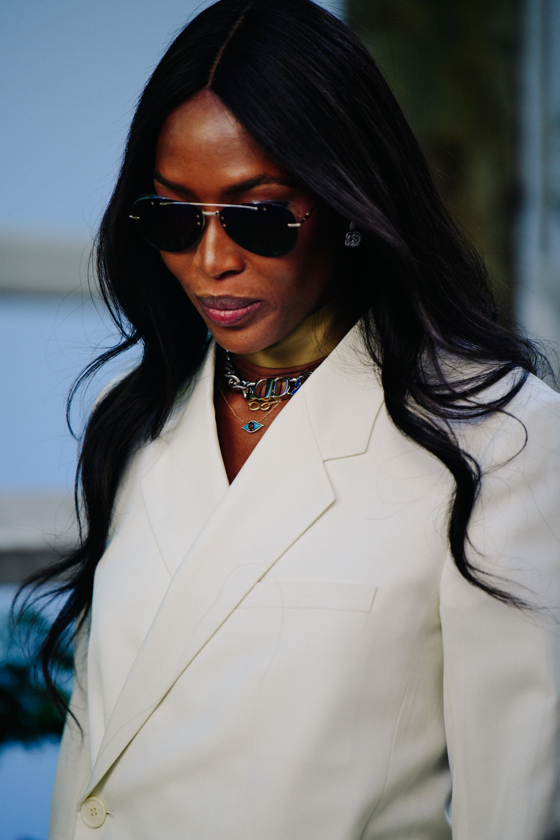 Model wearing white Christian Dior suit