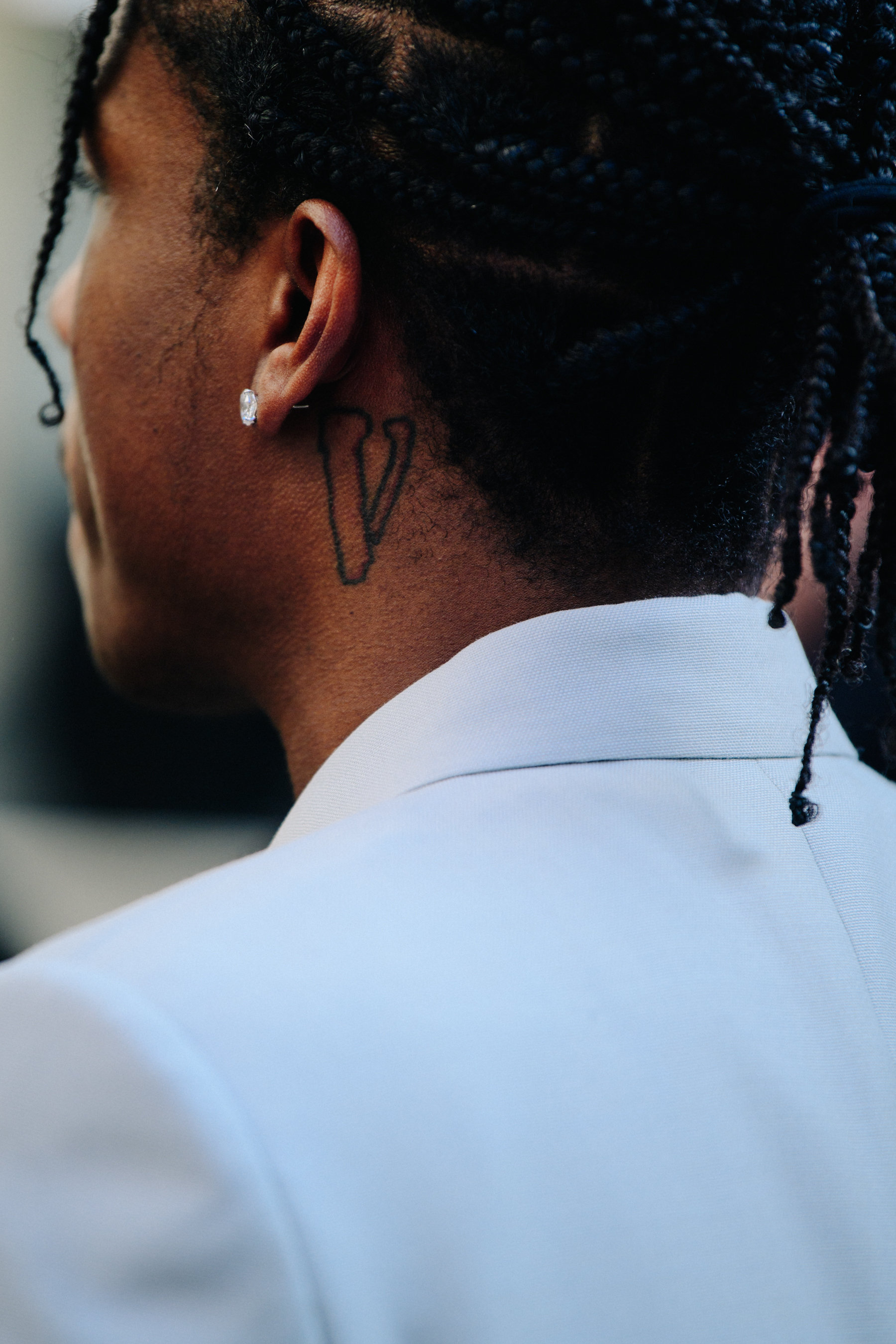 American rapper wearing Christian Dior suit