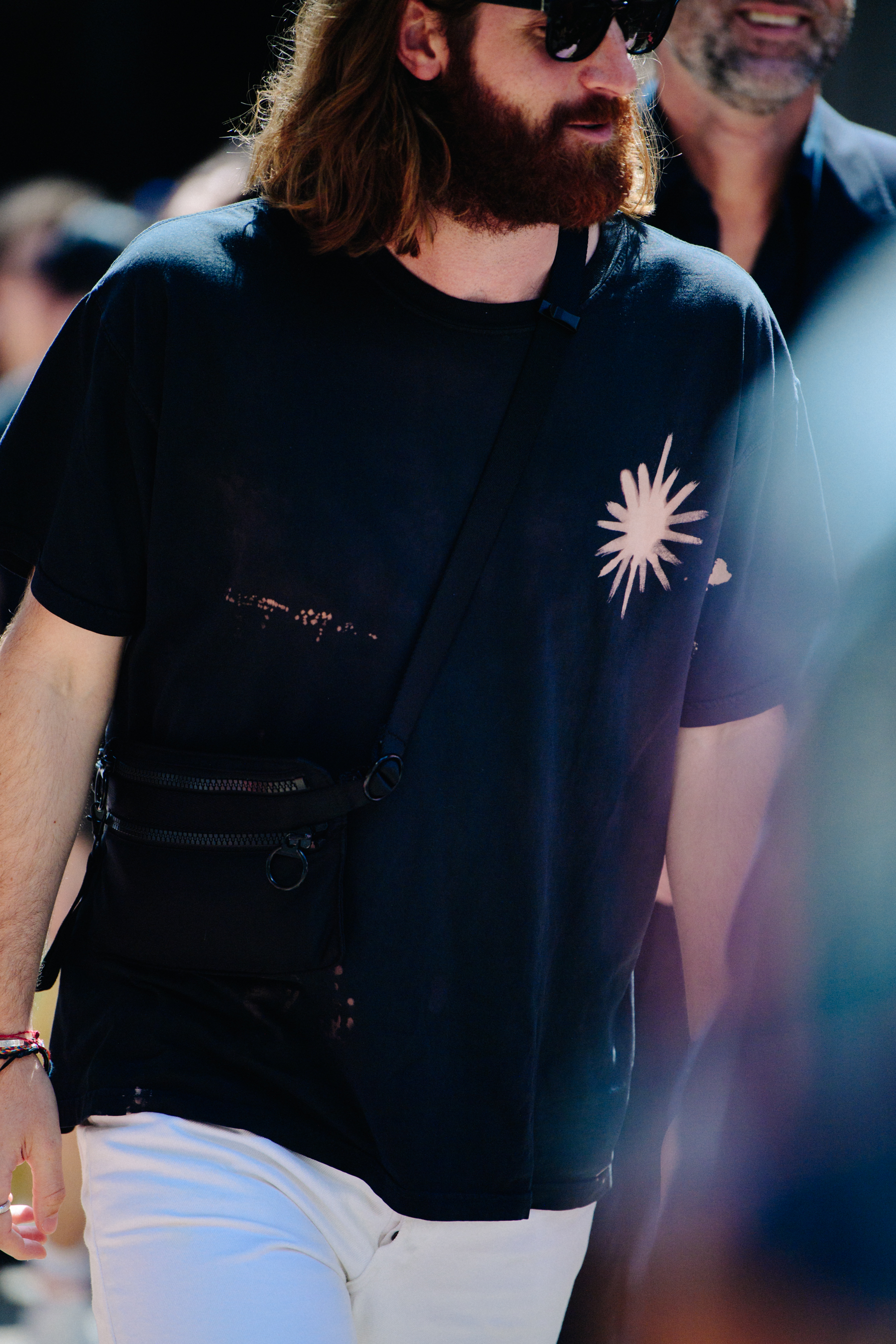 Man wearing dark tee shirt
