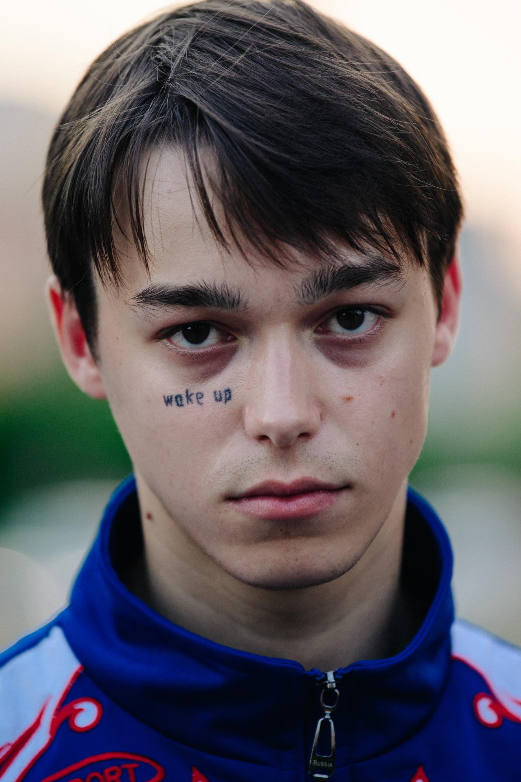 Portrait of model with face tattoo