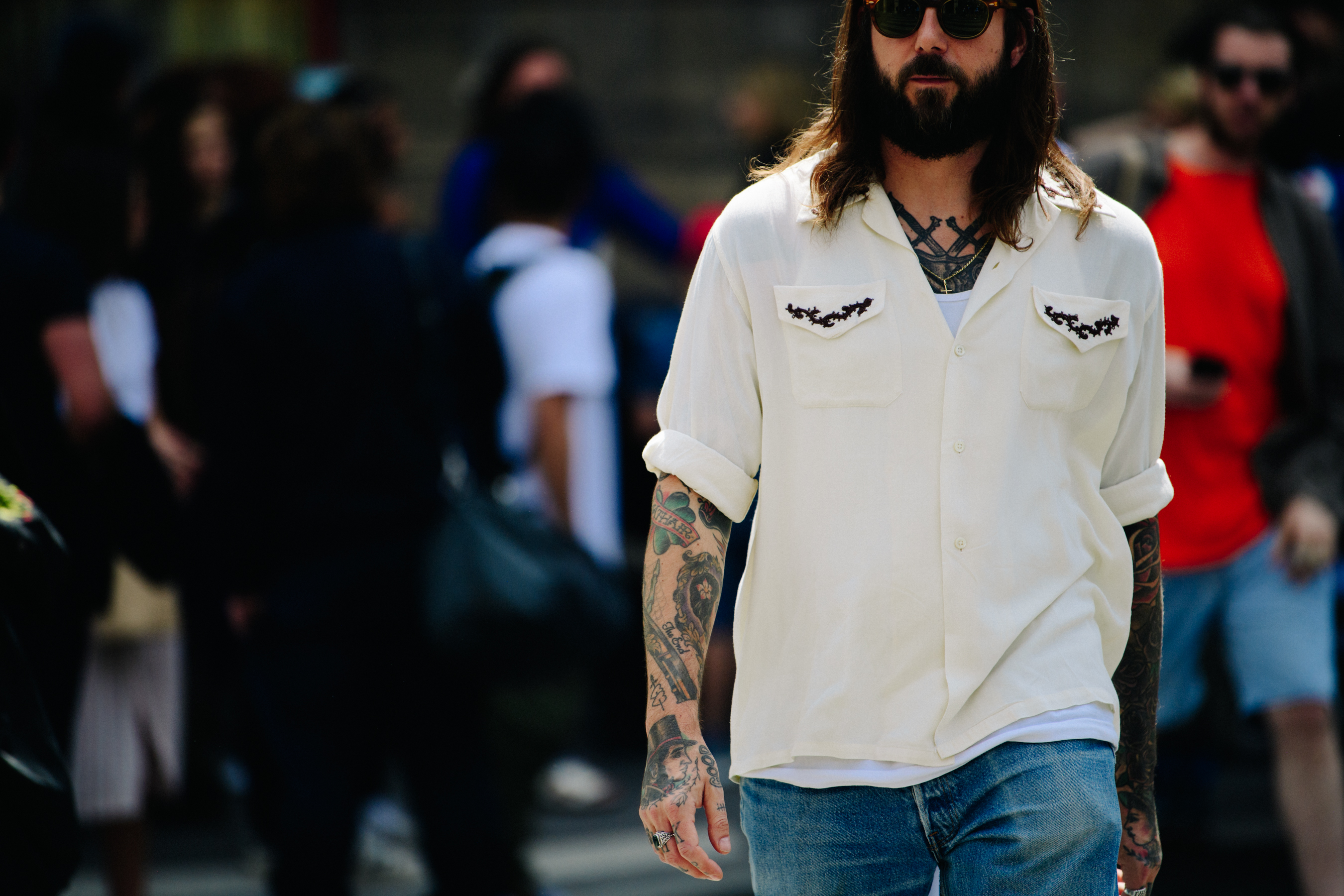 Man with hand and arm tattoos