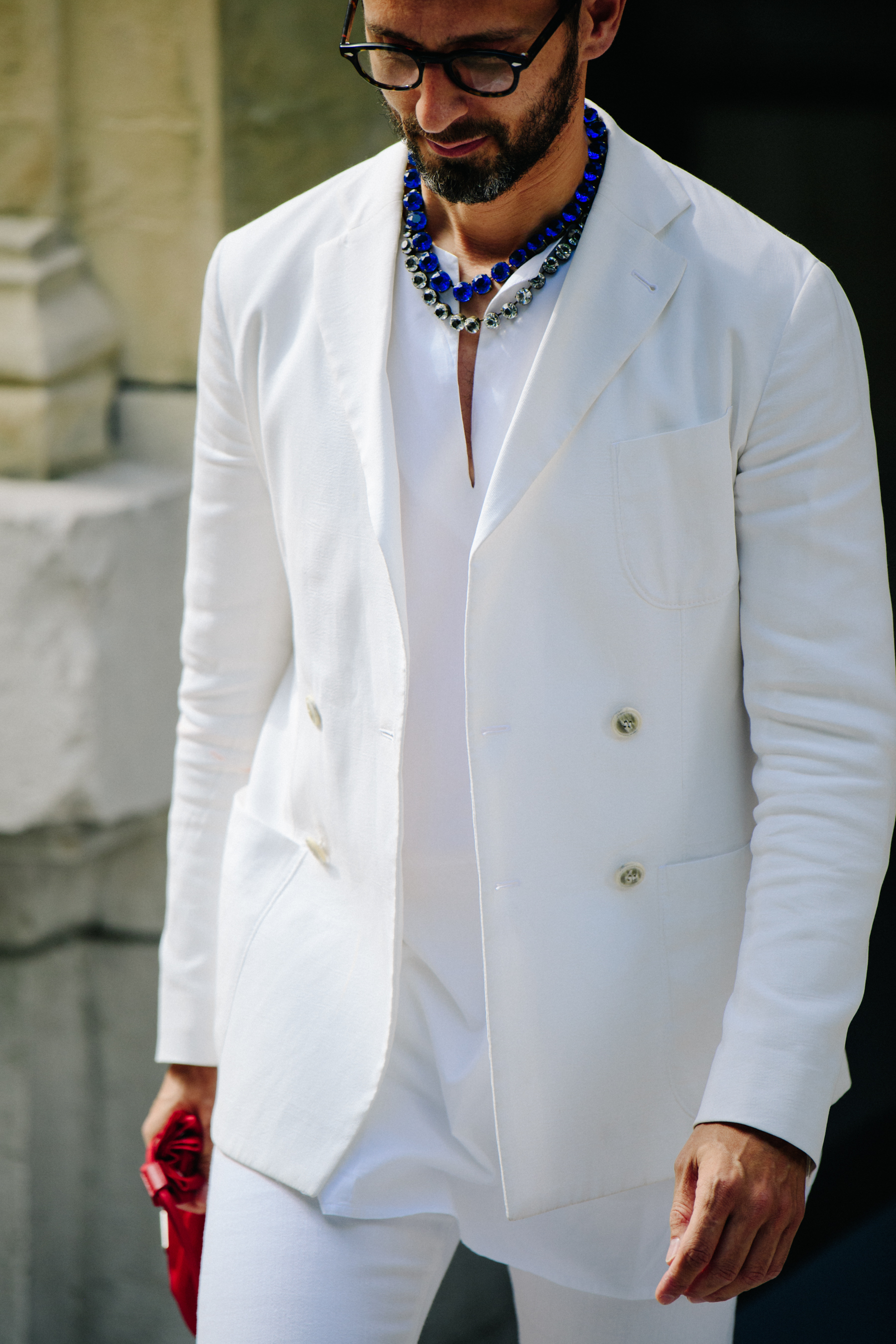 Italian man wearing white suit