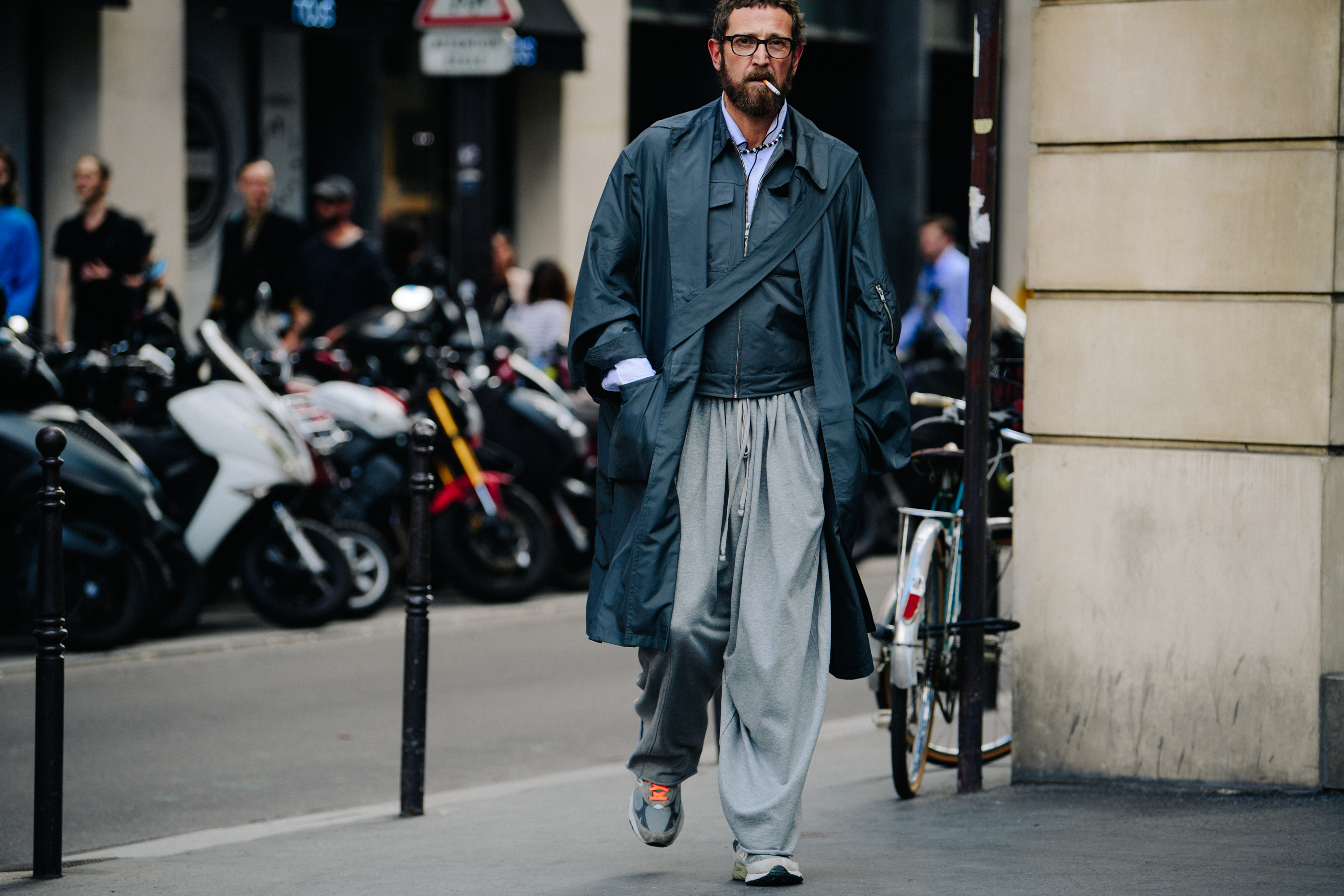 Man wearing grey coat