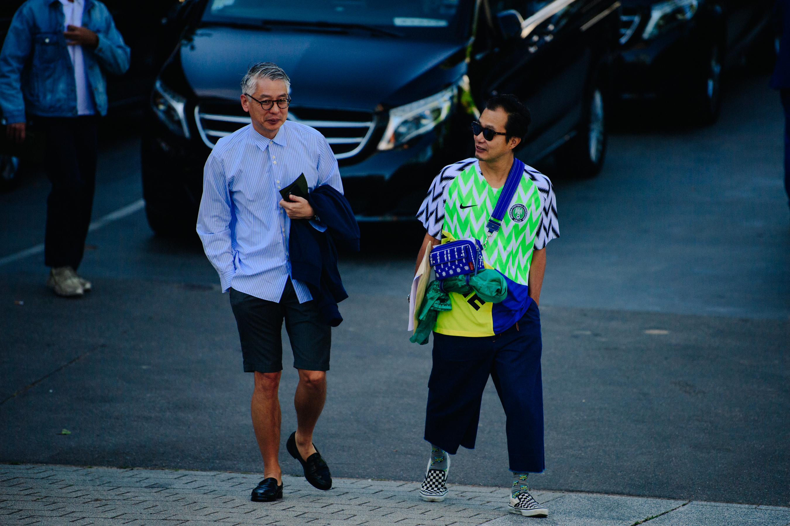 Two Japanese men wearing glasses