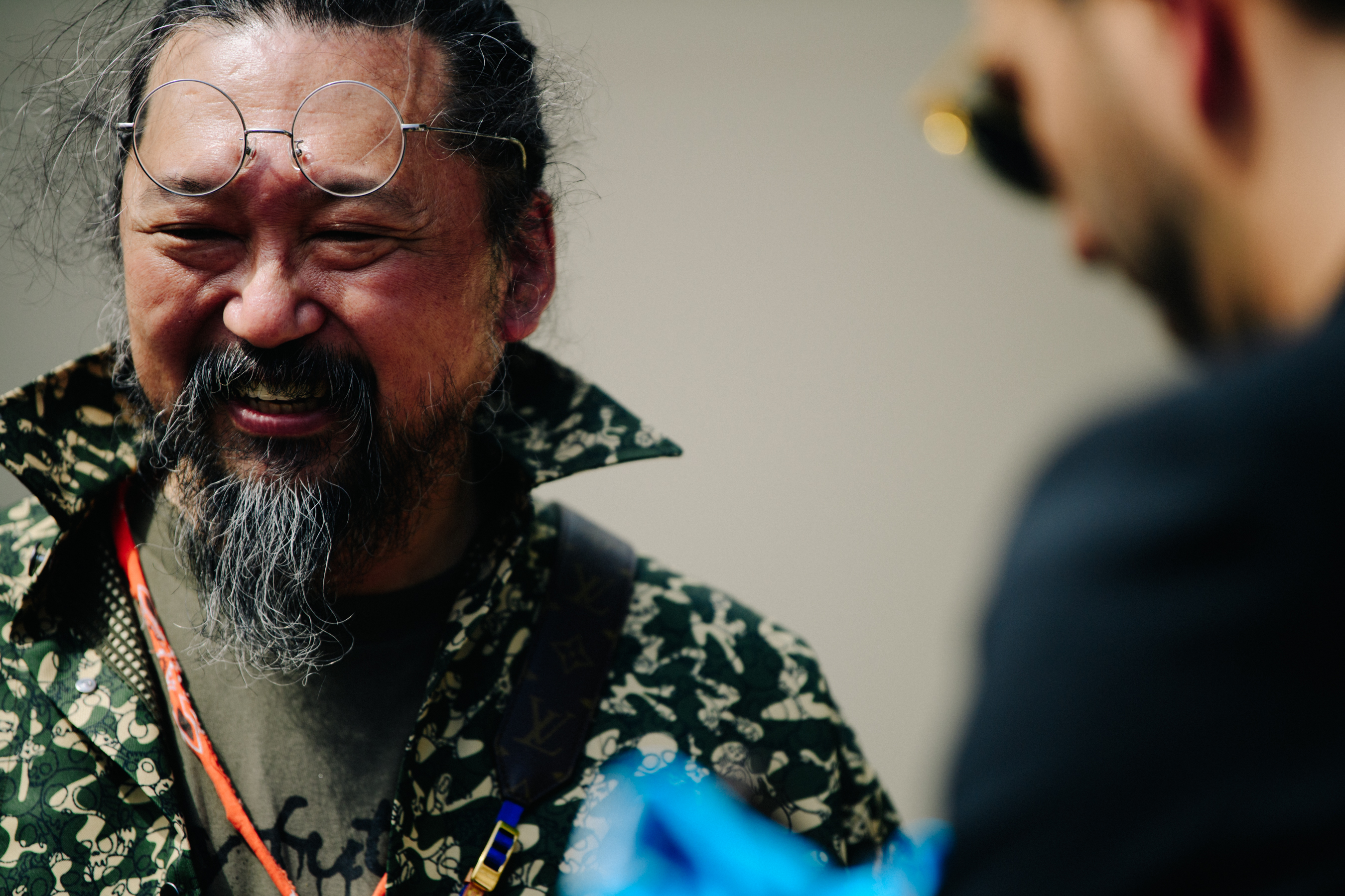 Japanese man wearing silver glasses