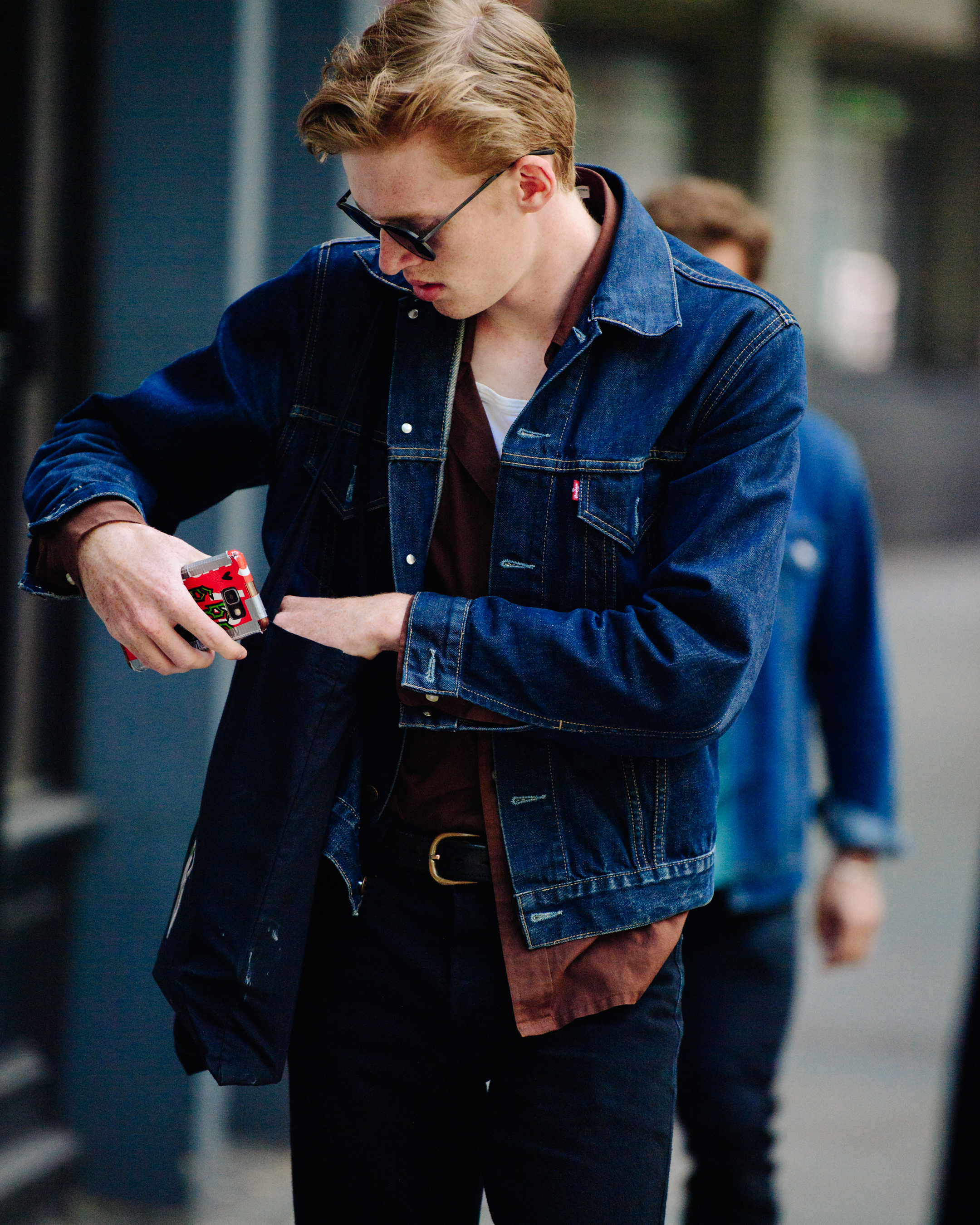 Man wearing blue denim jacket