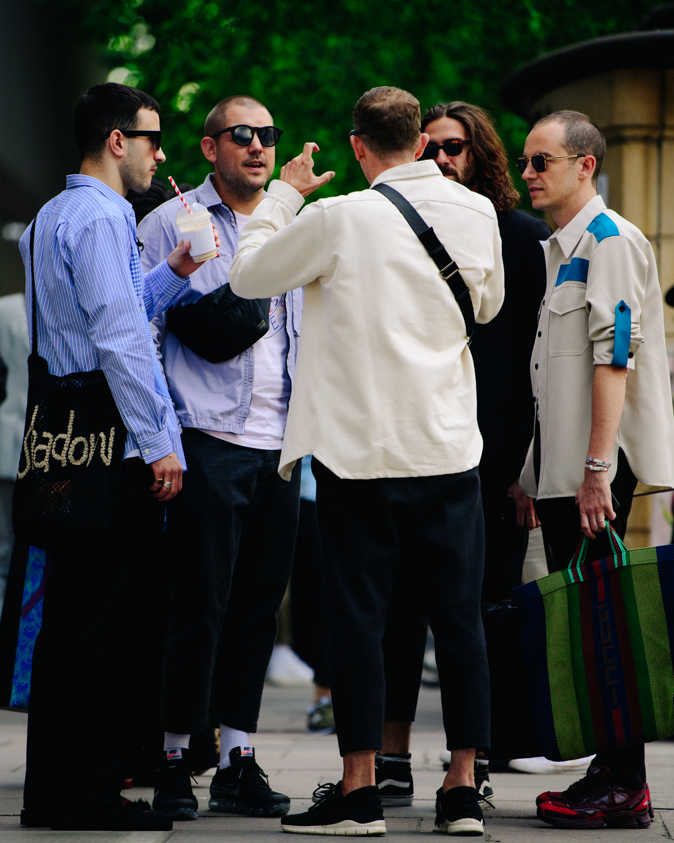 Group of men wearing stylish outfits
