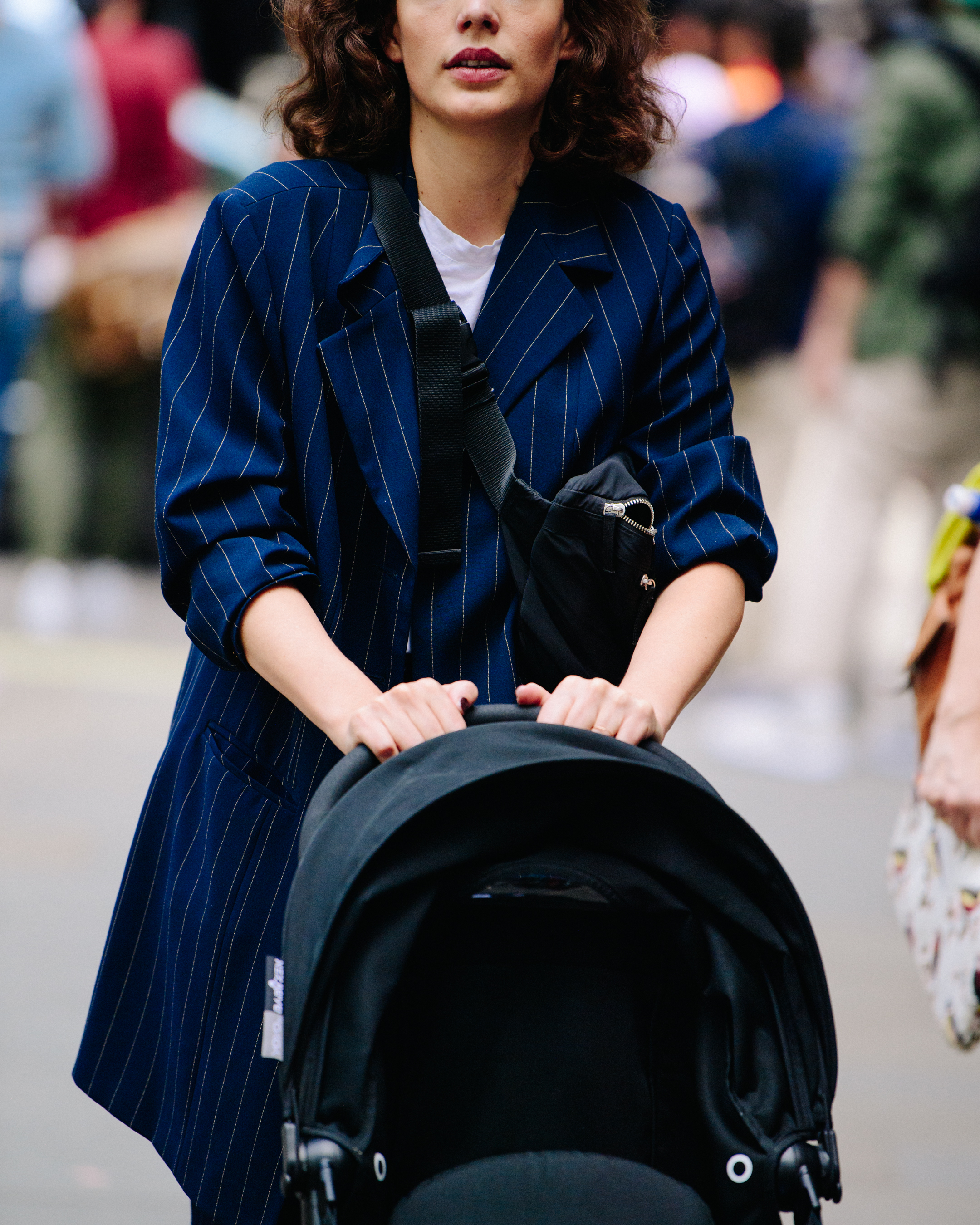 Woman wearing striped jacket