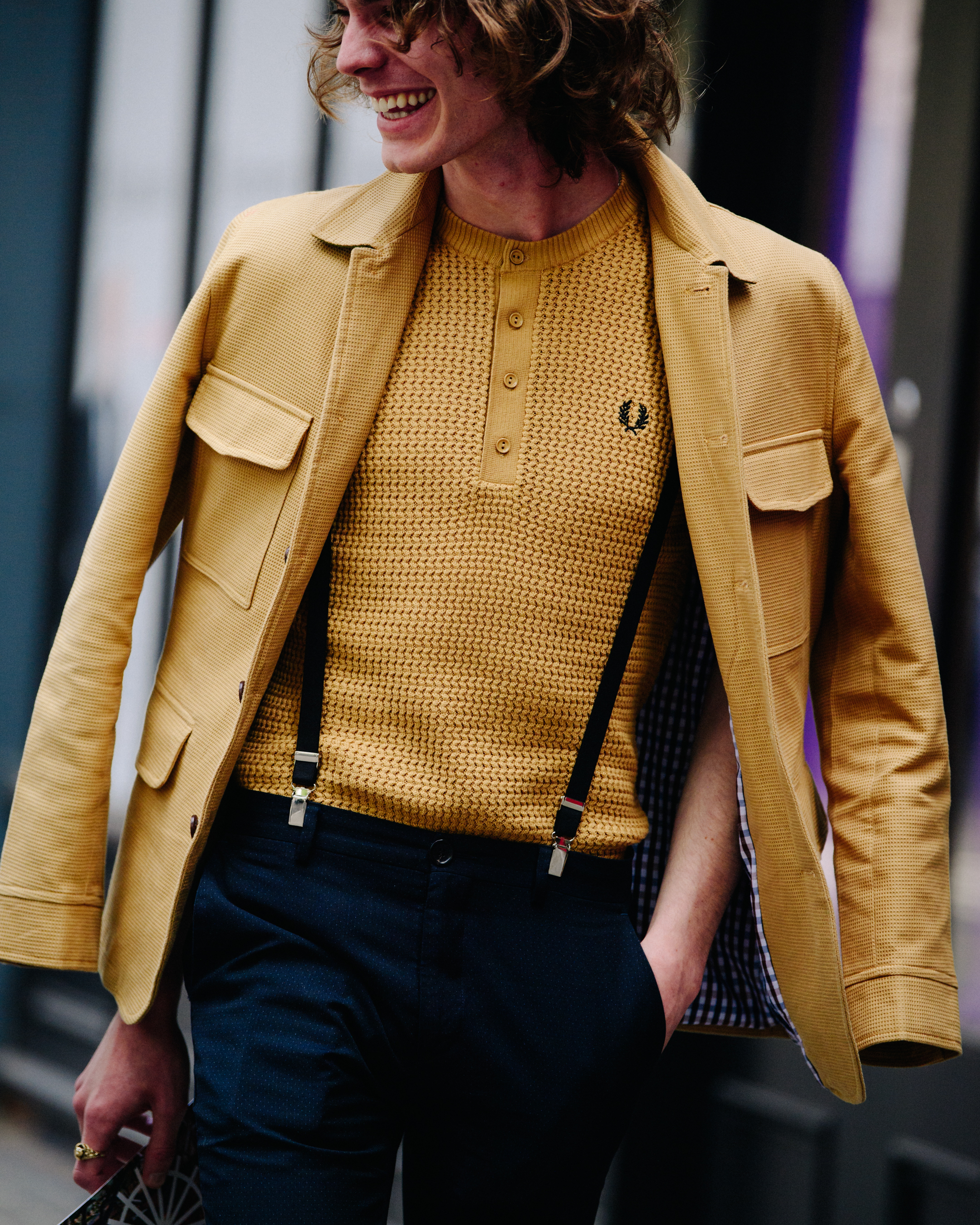 Man wearing yellow outfit