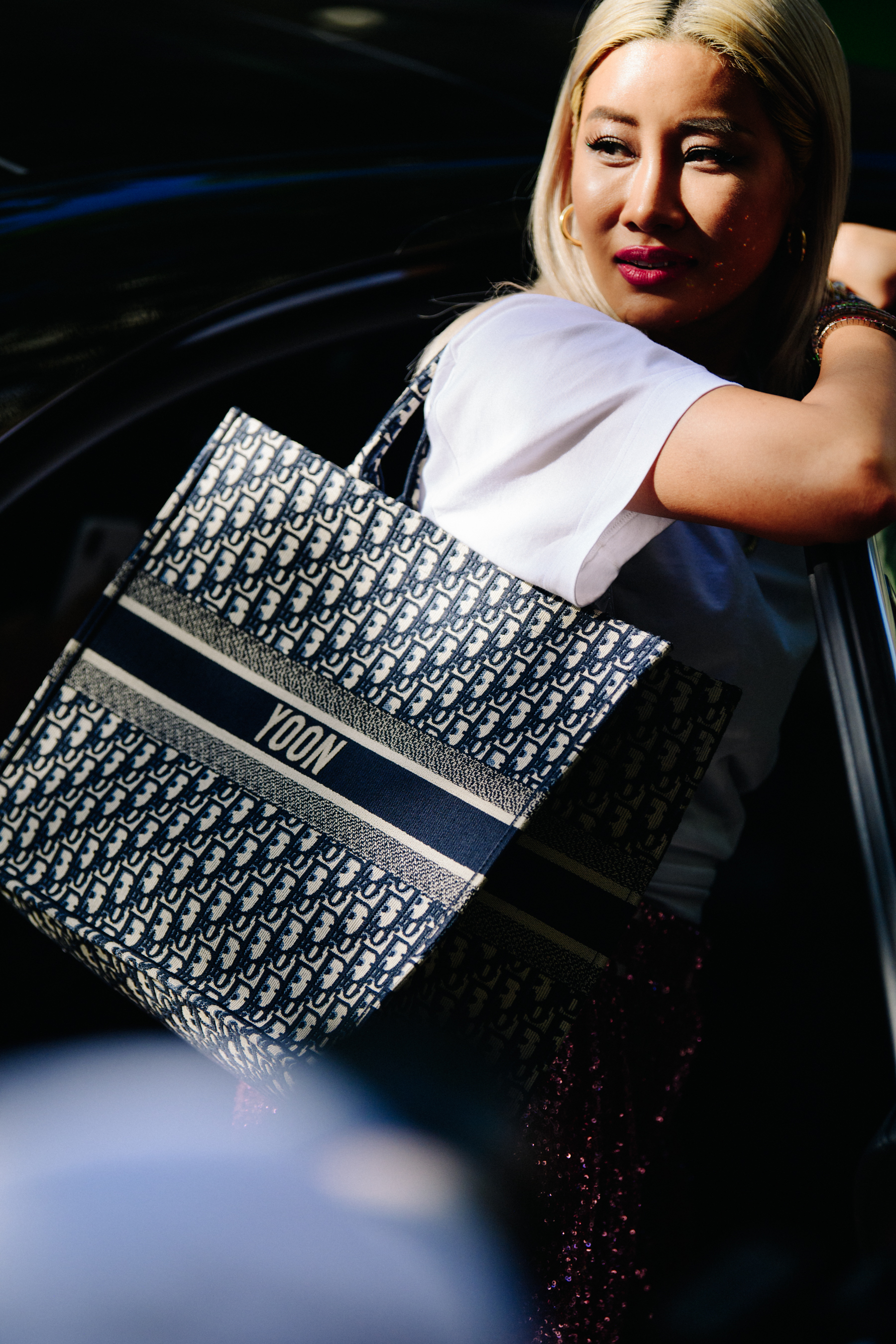 Woman wearing Christian Dior bag