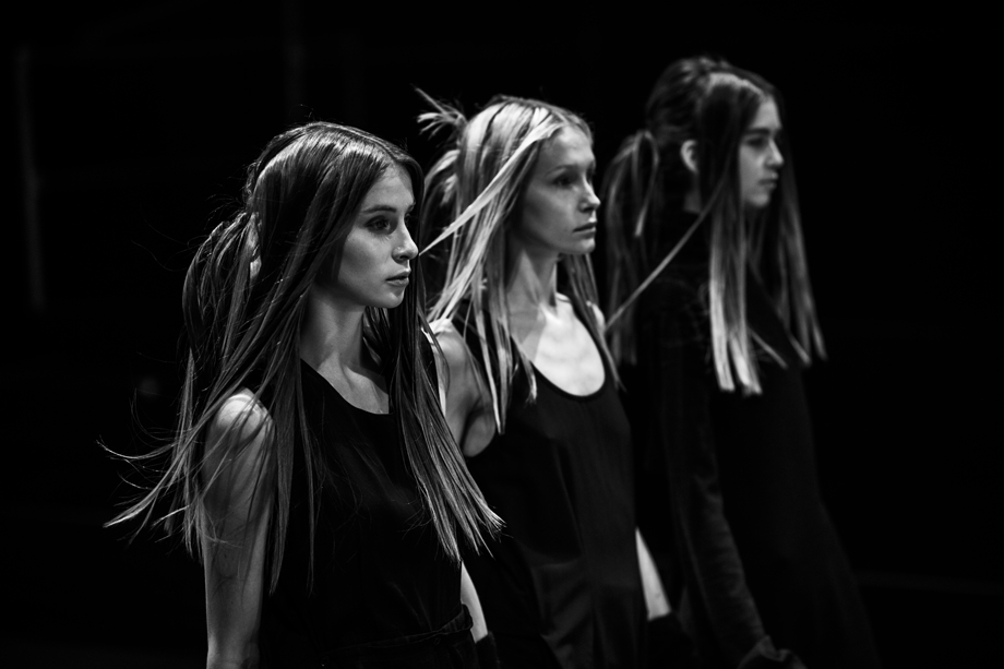 Three models walking the Nom*d runway