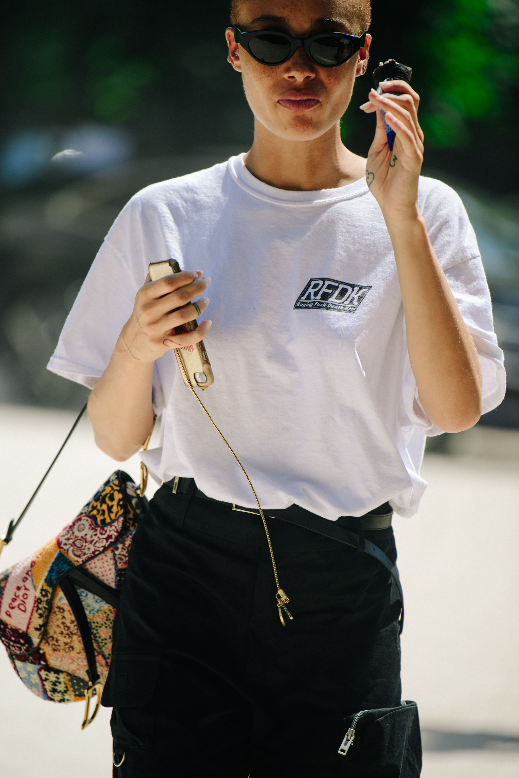 British model wearing white tee shirt
