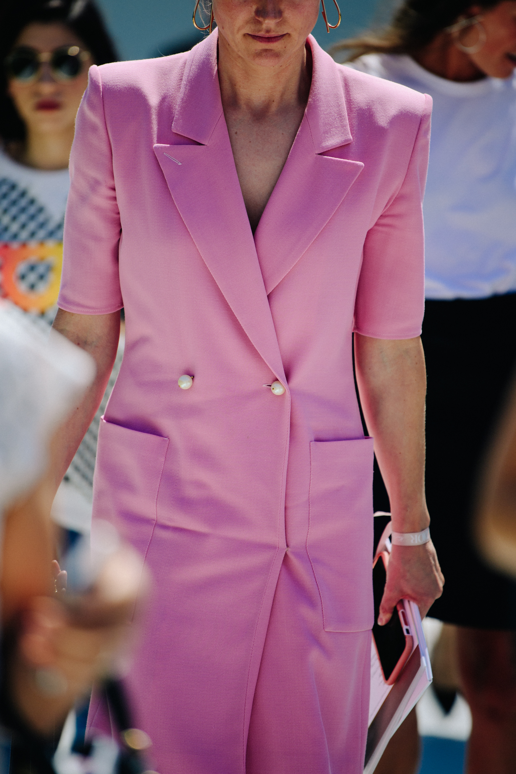 Woman wearing pink dress suit