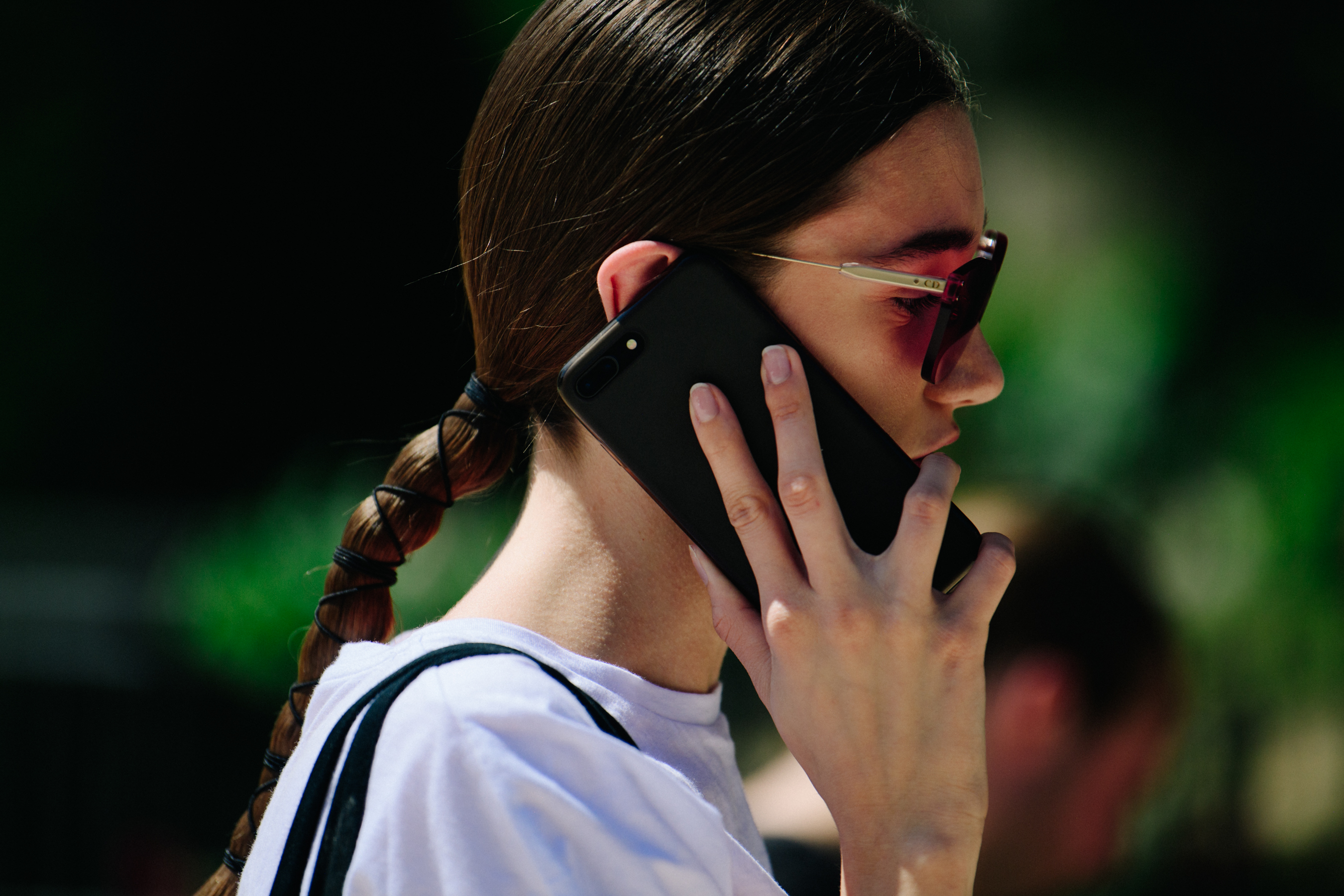 Model wearing pink sunglasses