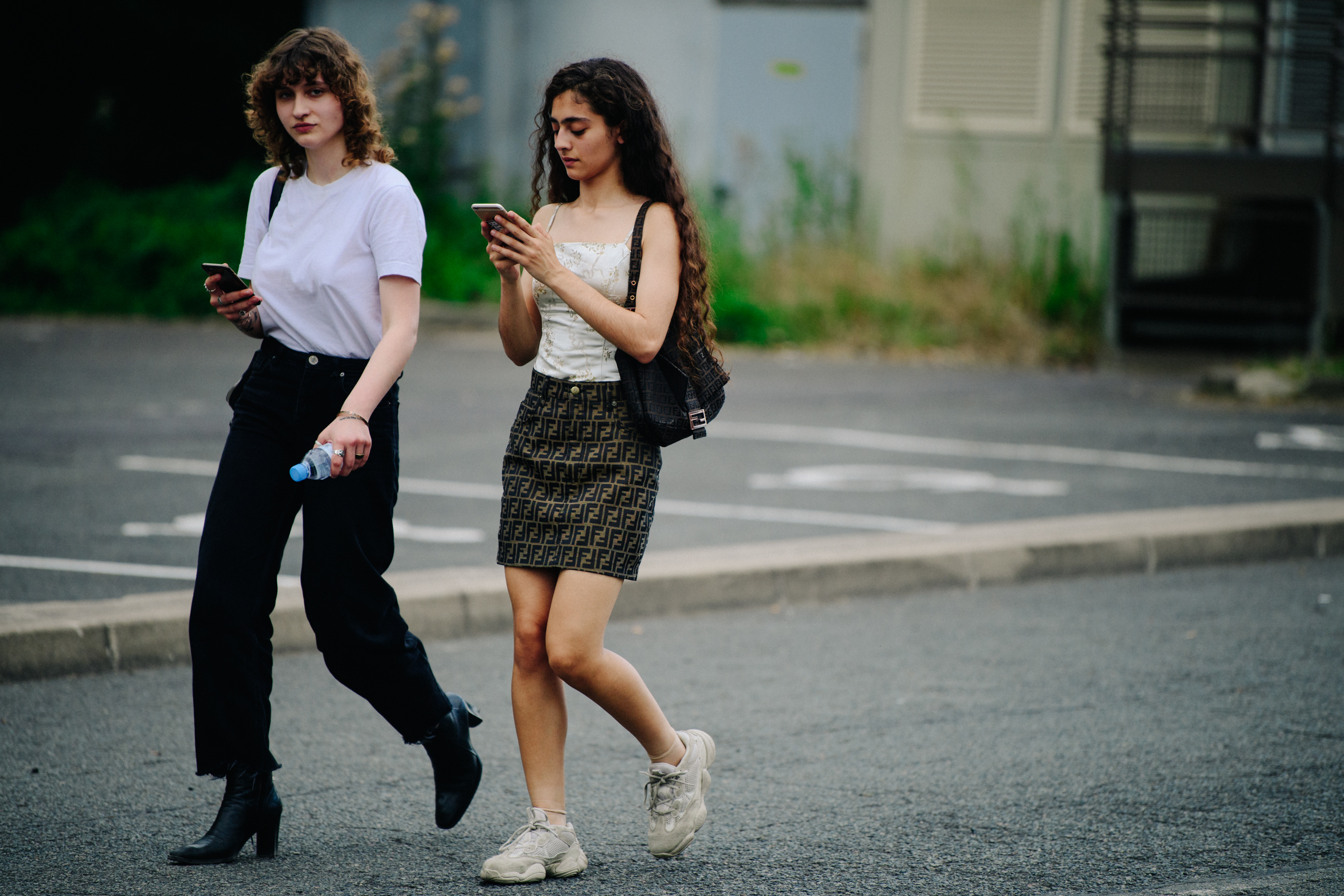 Two women wearing Fendi and Yeezy