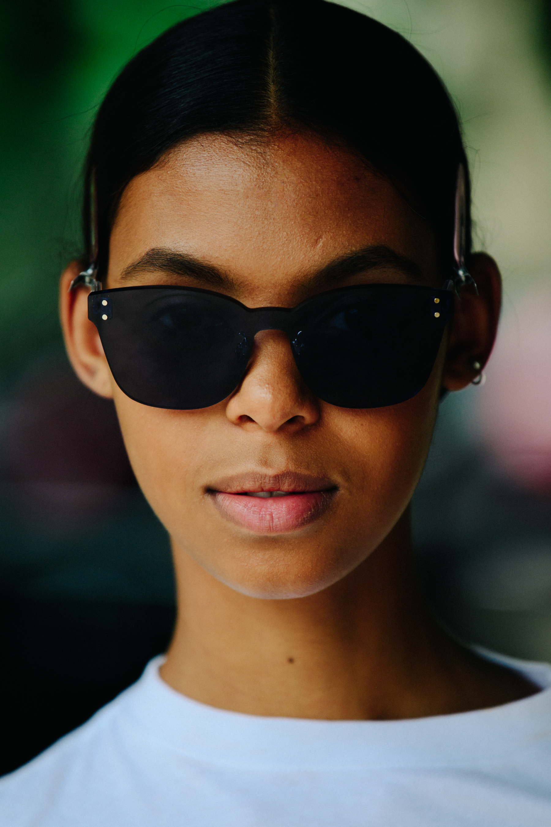 Portrait of model wearing Christian Dior sunglasses