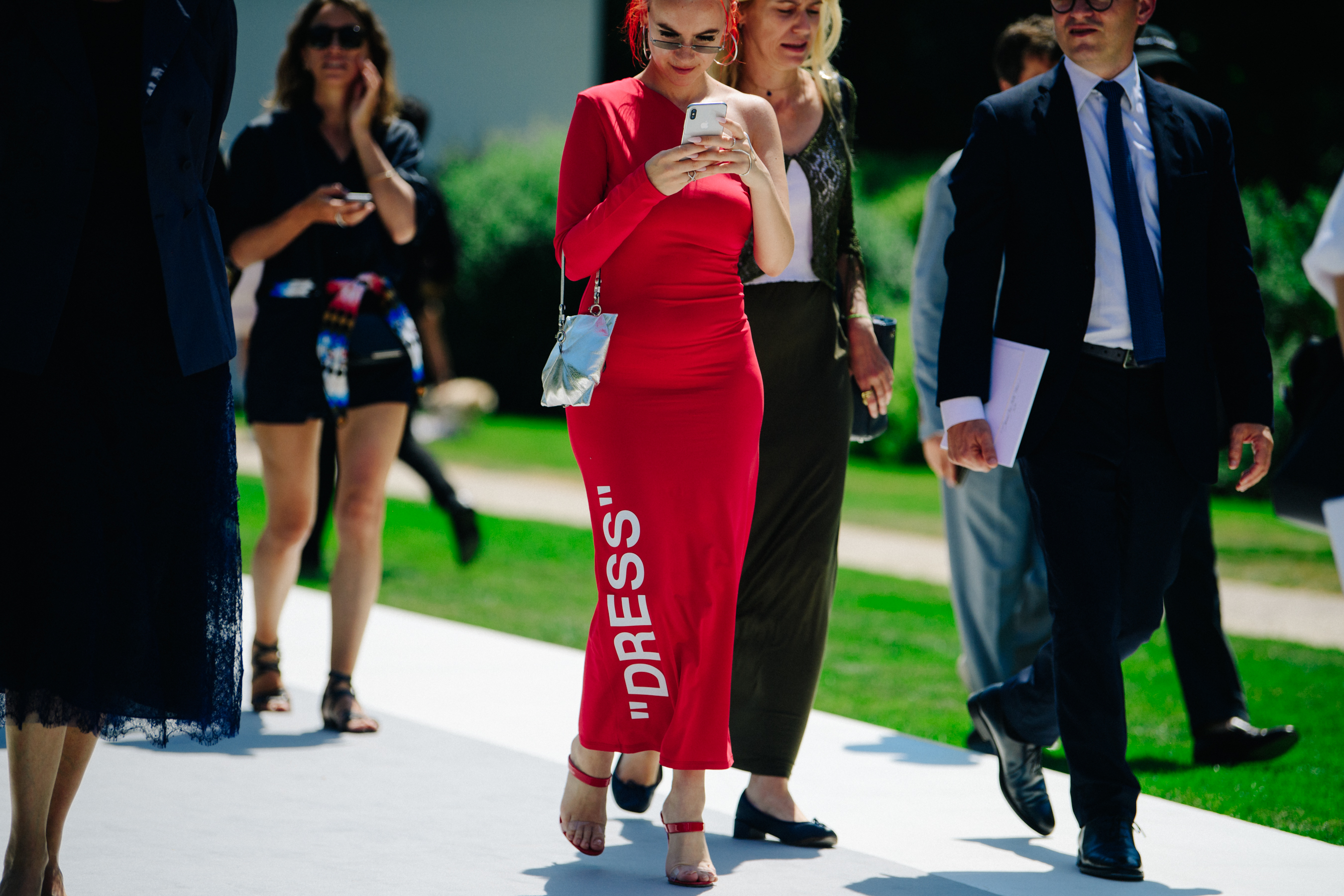 Woman wearing red Off-White dress