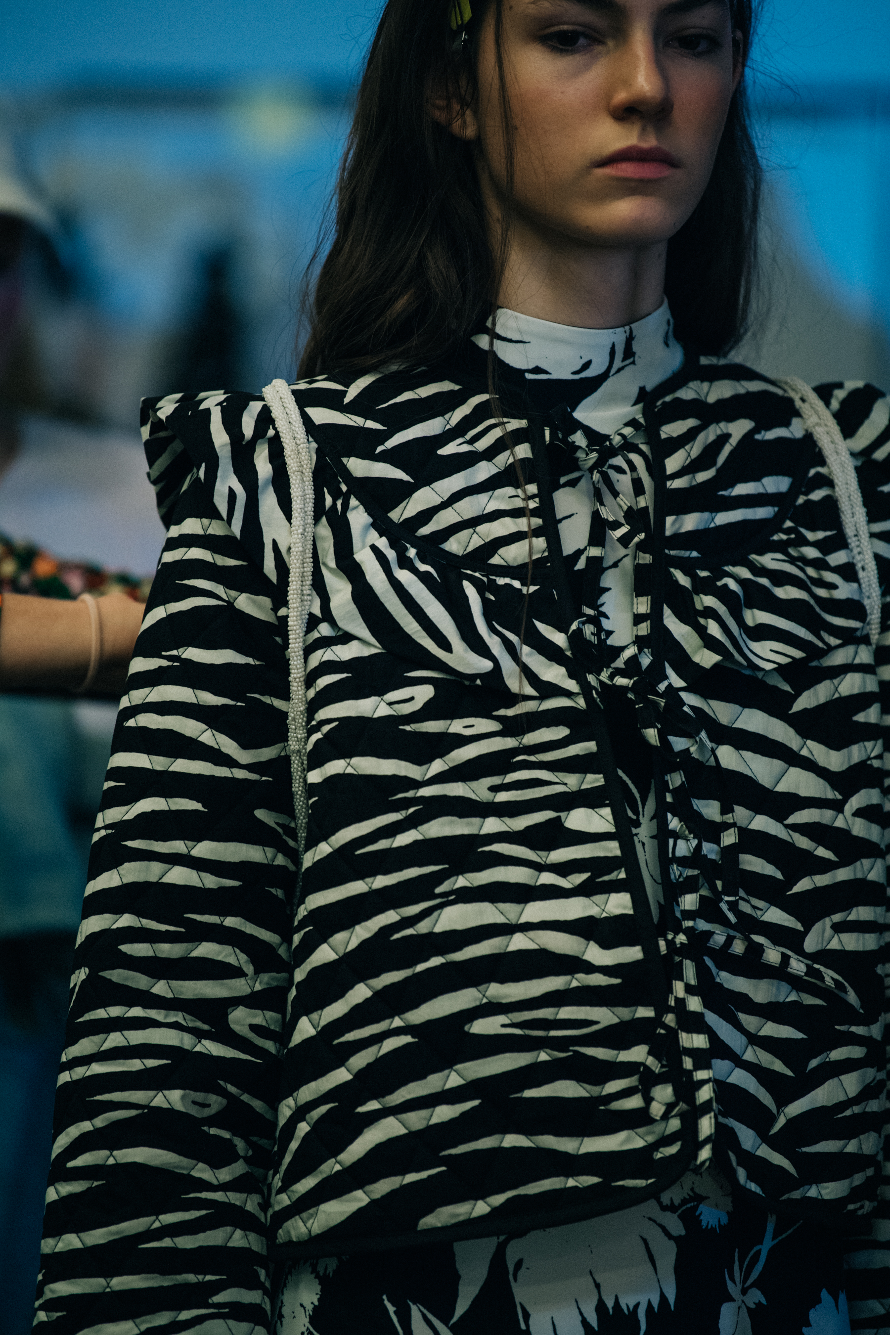Model wearing black and white outfit at Ganni