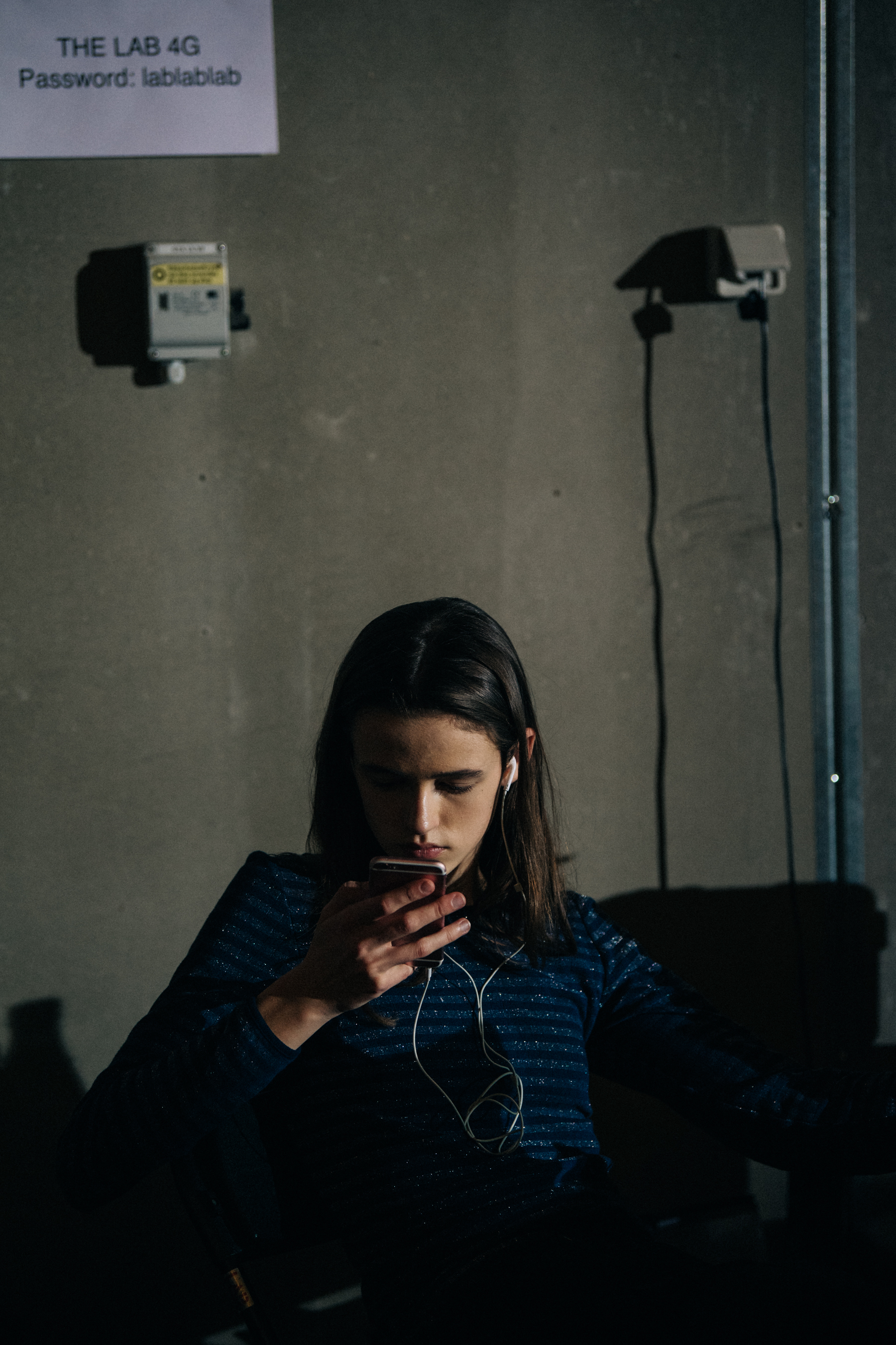 Model waiting backstage at Ganni