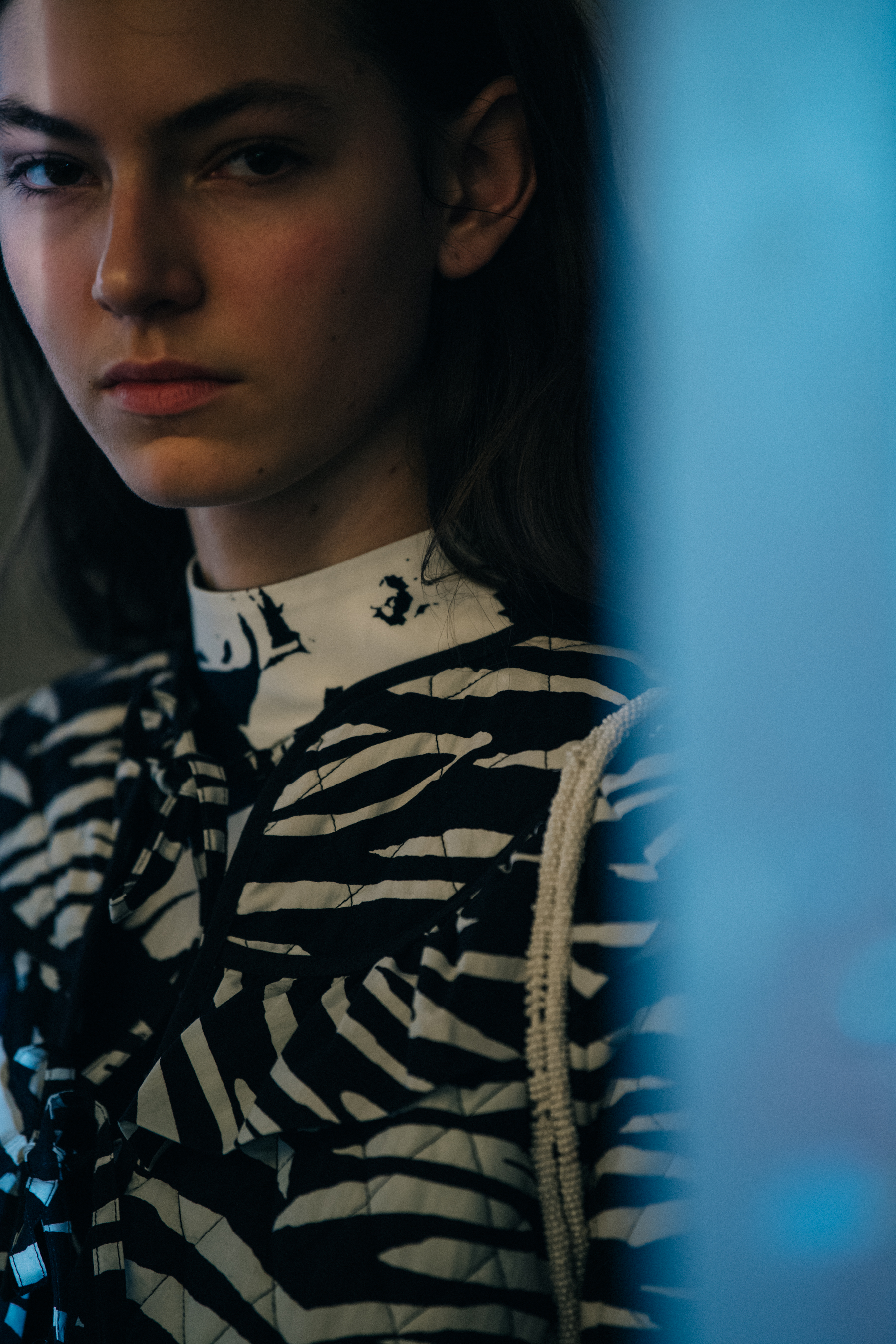 Model wearing black and white outfit at Ganni