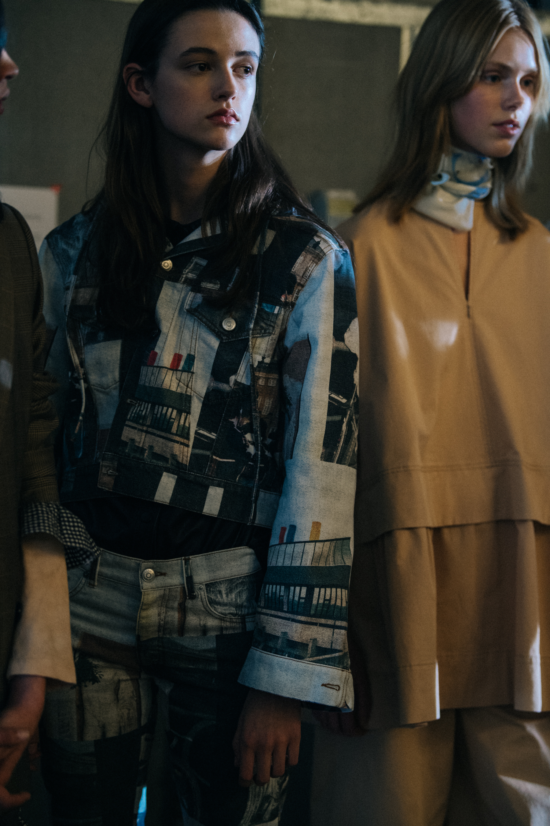 Models in lineup backstage at Ganni