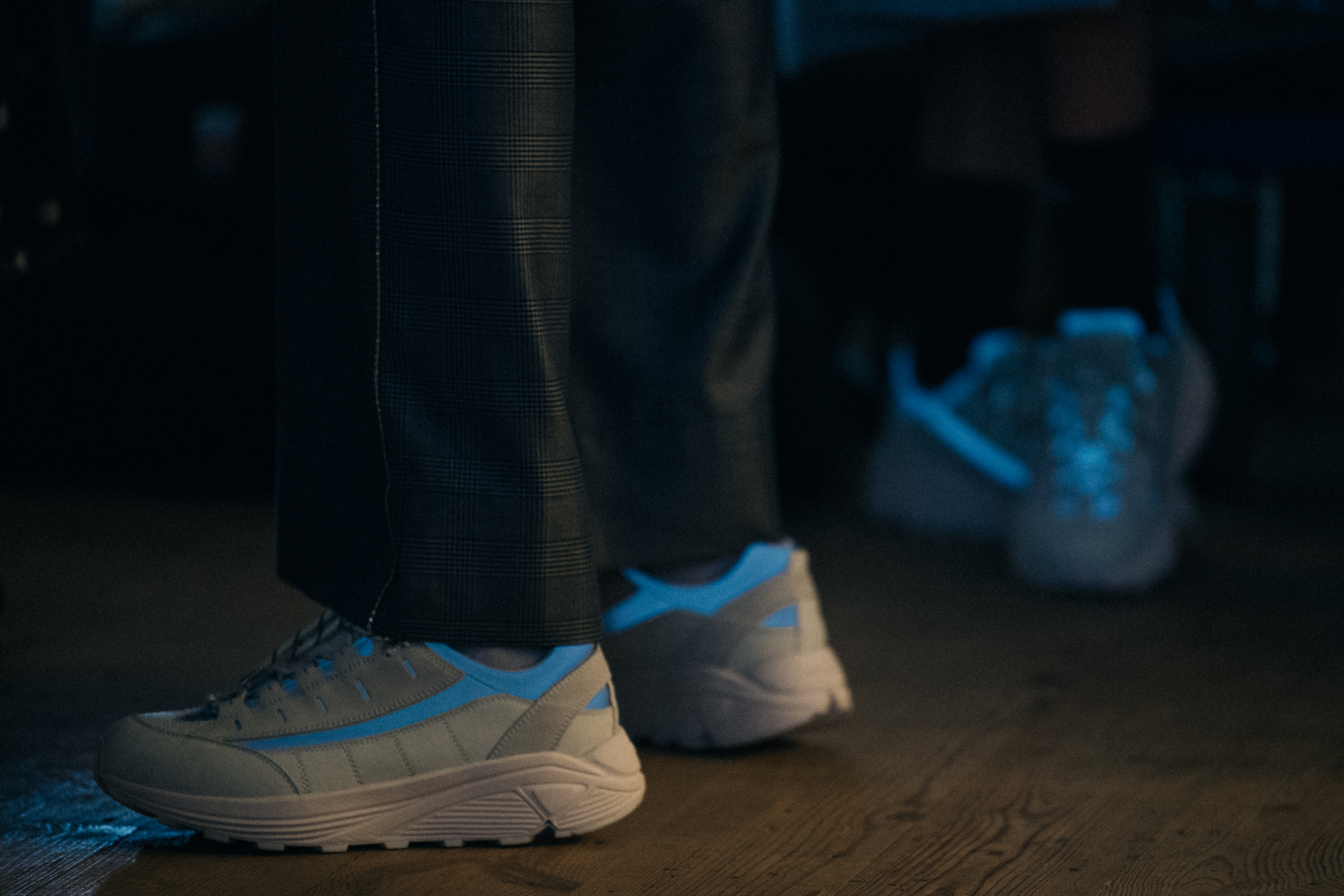 White sneakers backstage at Ganni