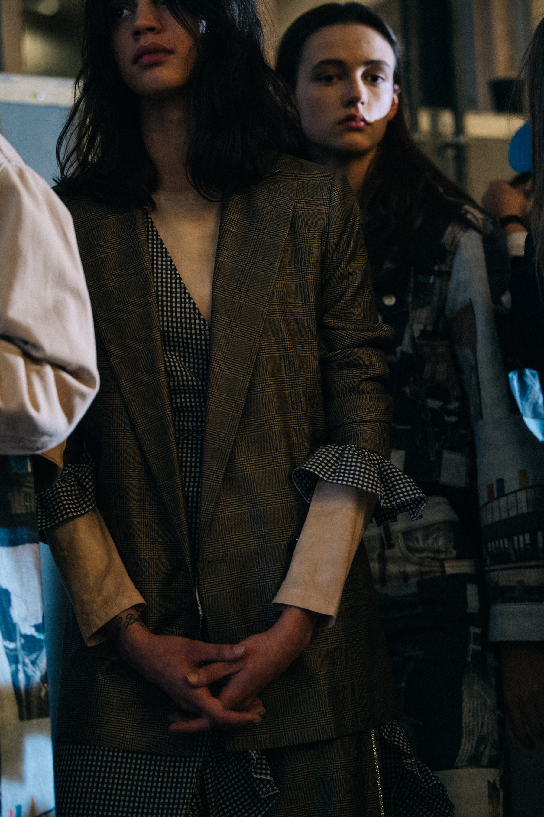 Model wearing brown outfit at Ganni