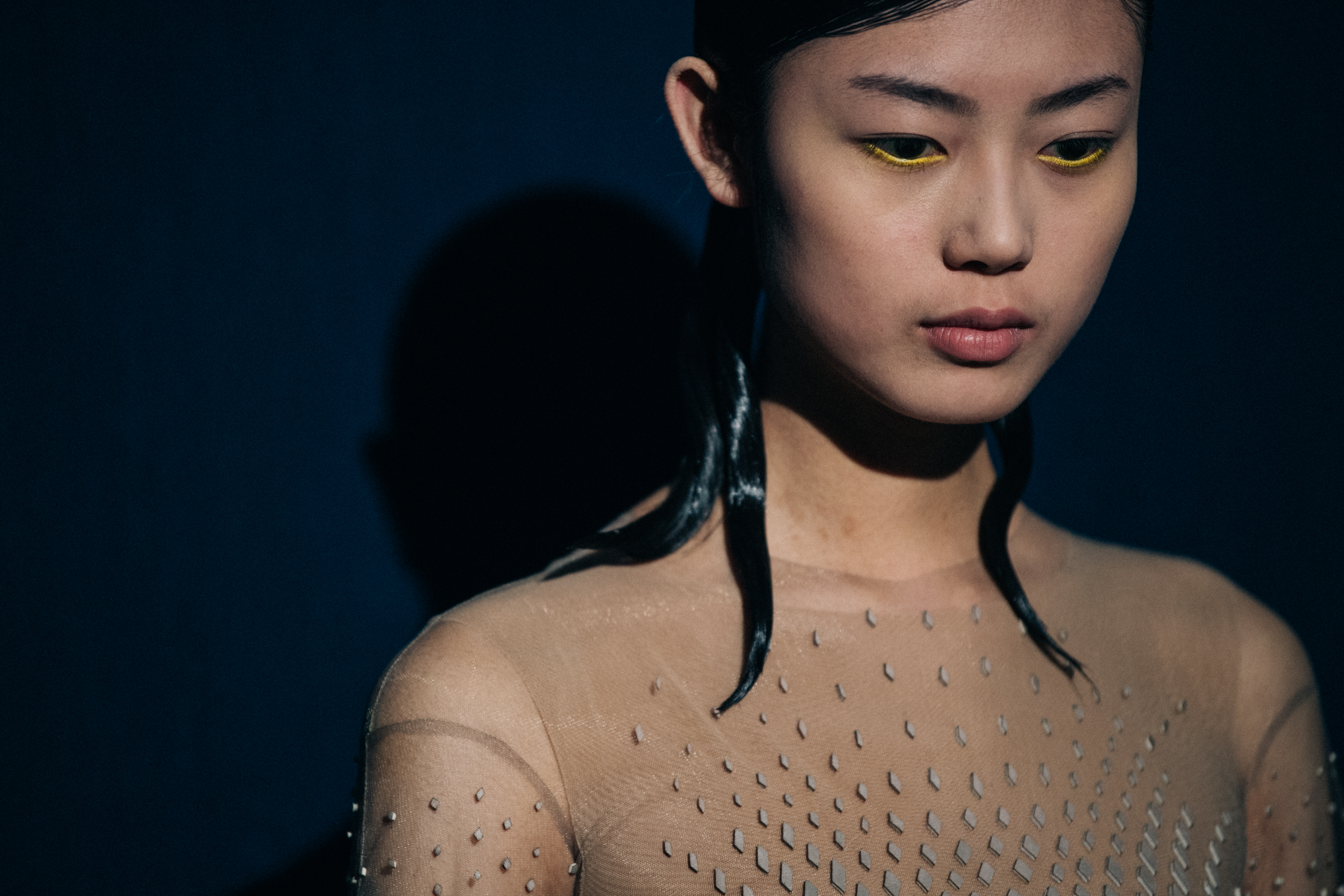 Model wearing elegant designed dress