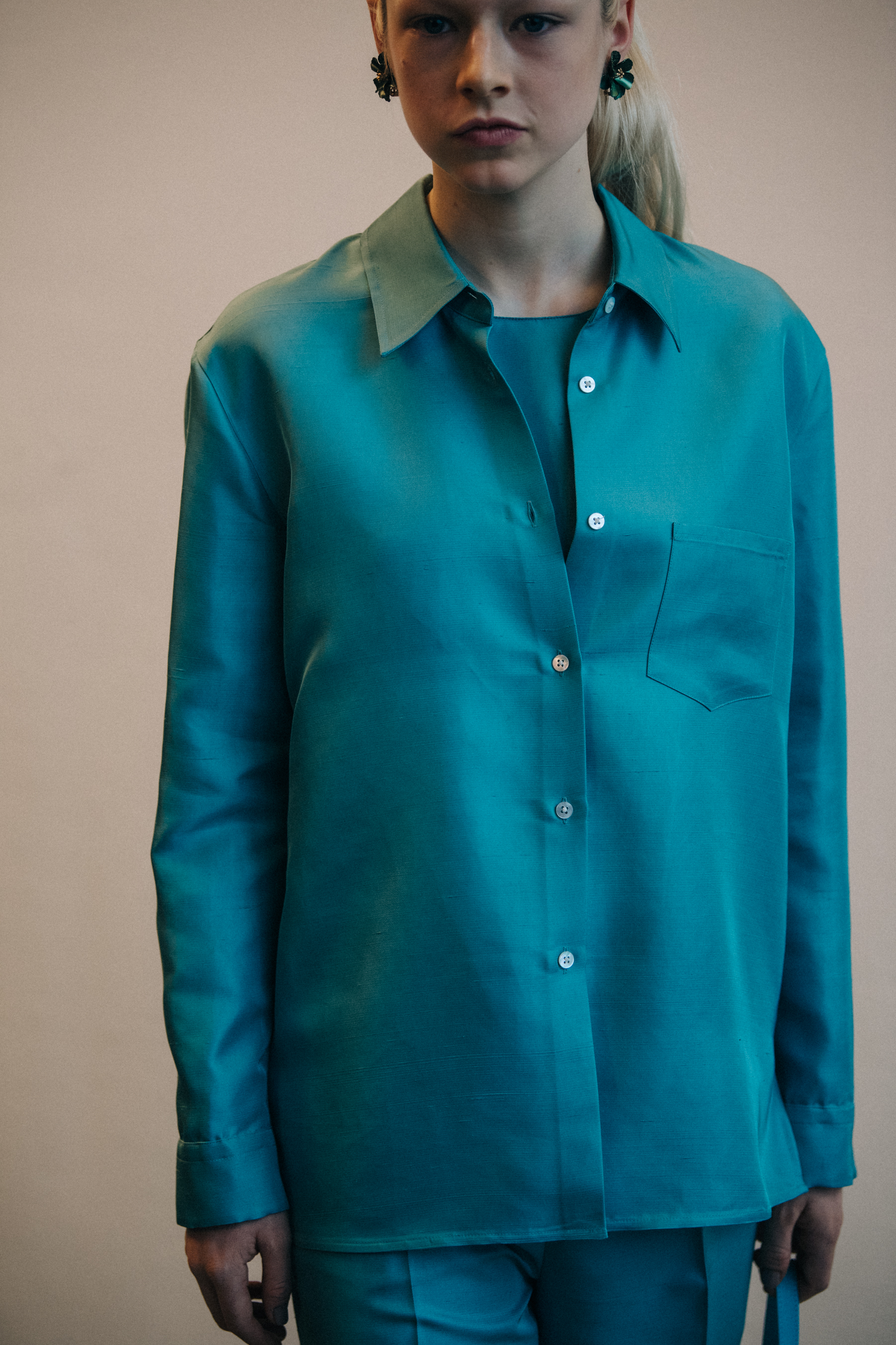 Model wearing blue outfit at Mansur Gavriel