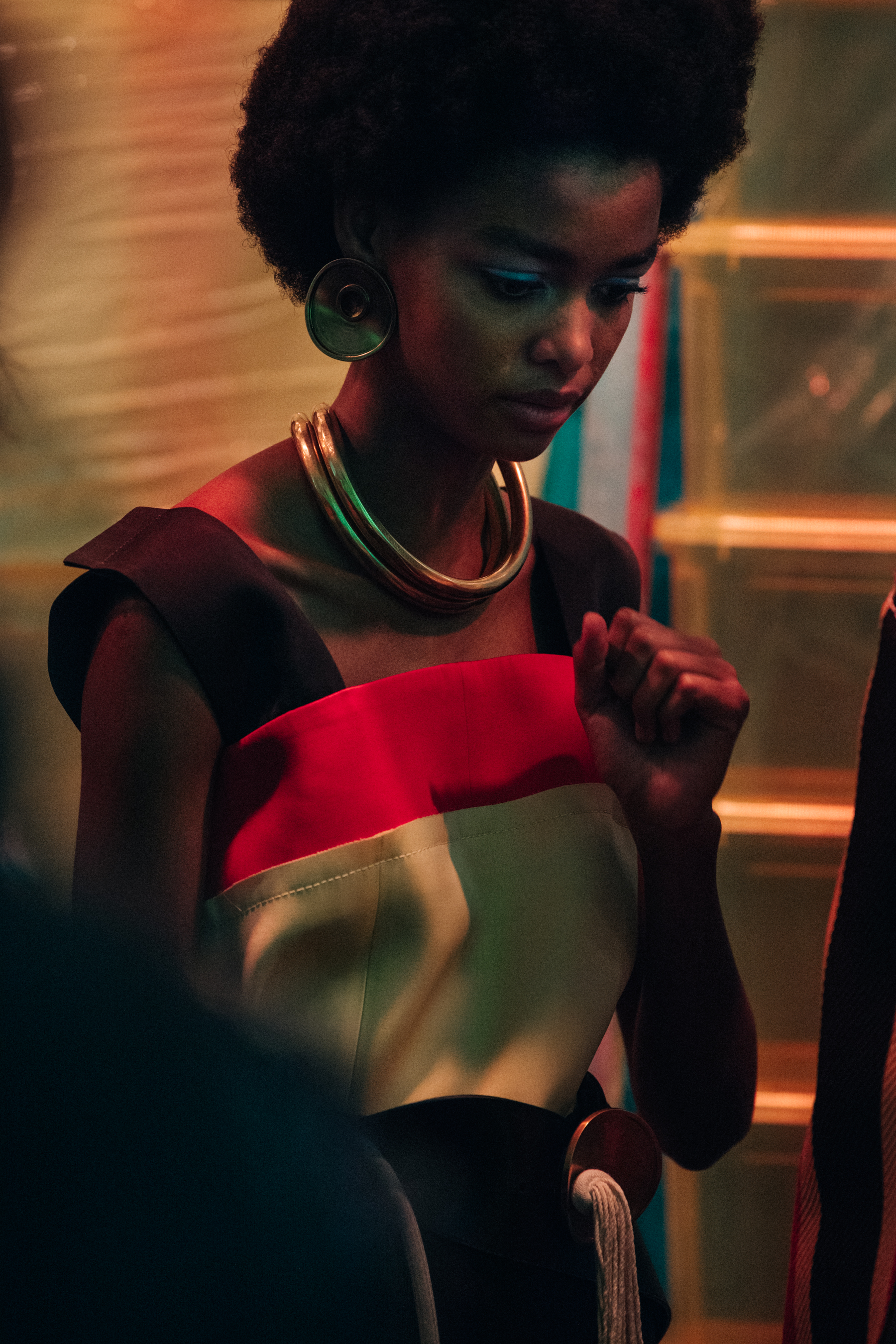 Model wearing red and white dress at Marni