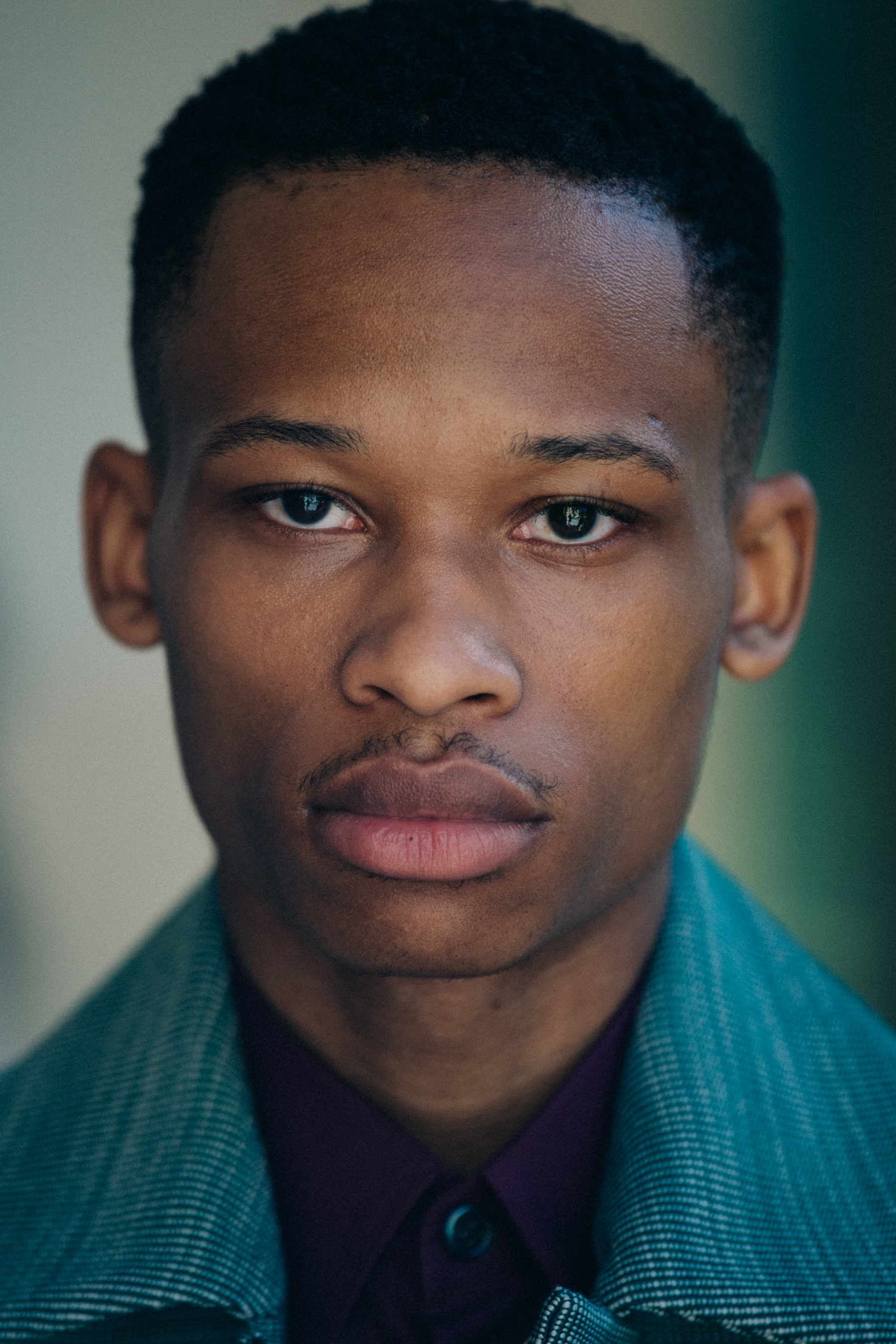 Portrait of model with short dark hair